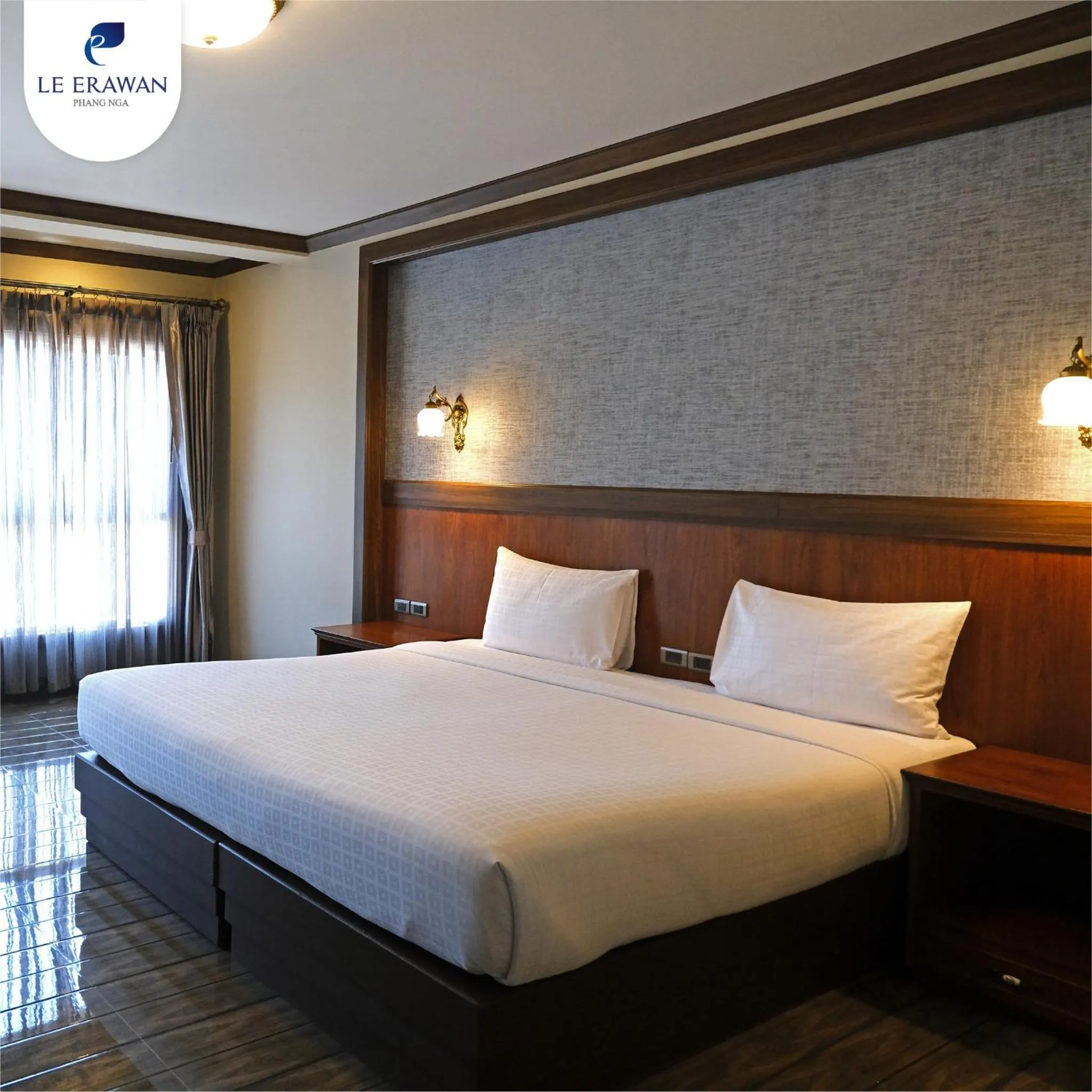 Bed in Le Erawan Phang Nga Hotel