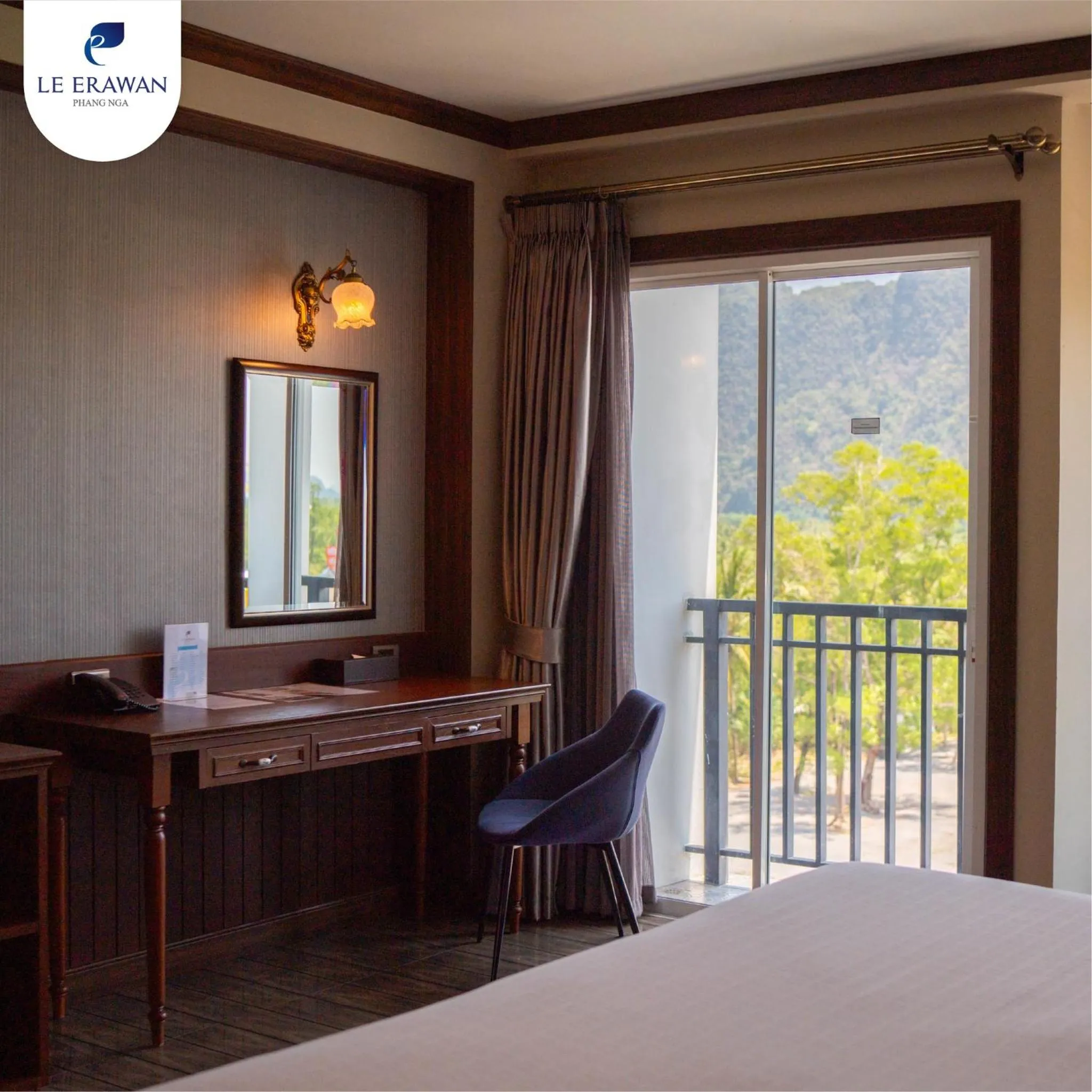 Bed in Le Erawan Phang Nga Hotel