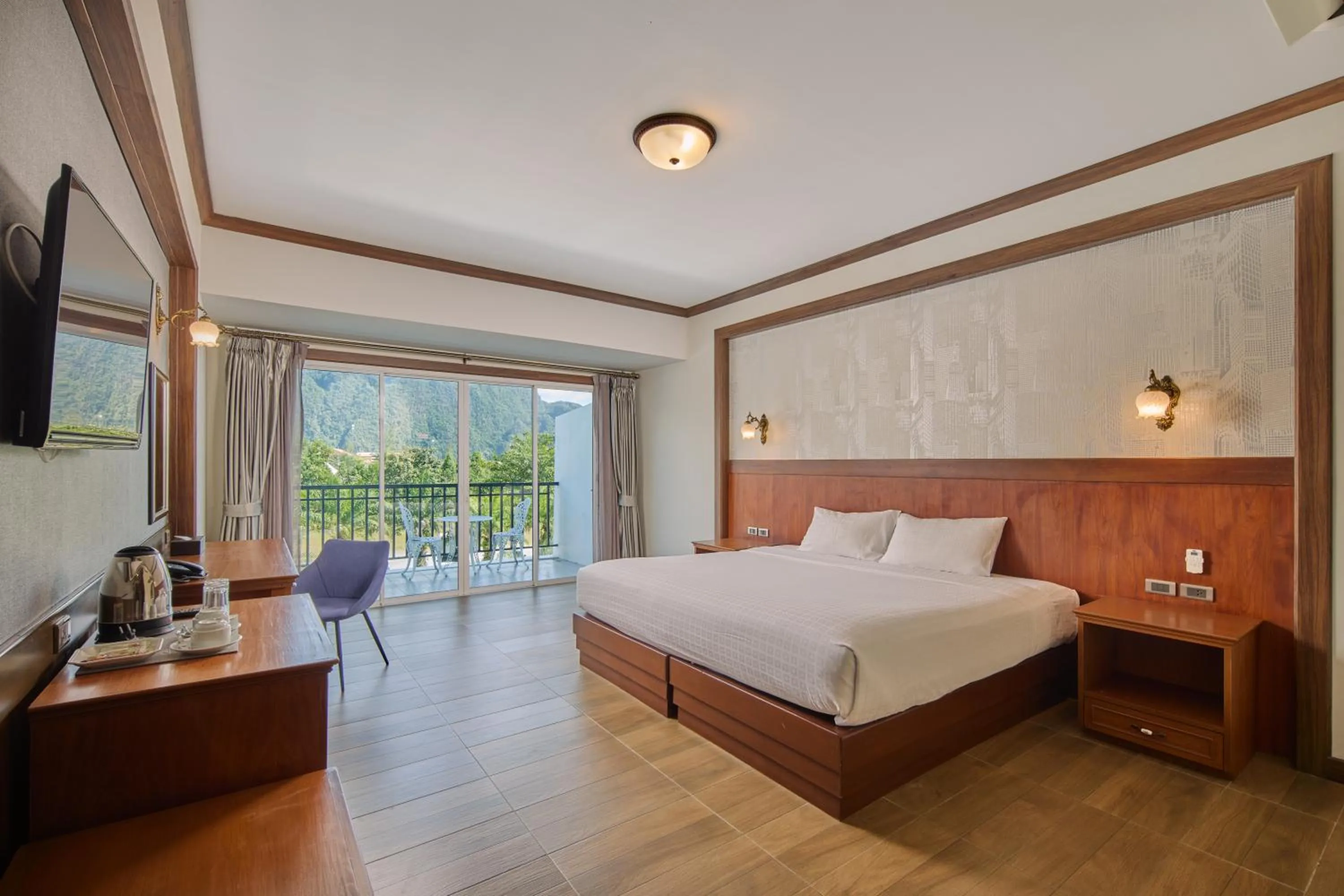 Bed in Le Erawan Phang Nga Hotel