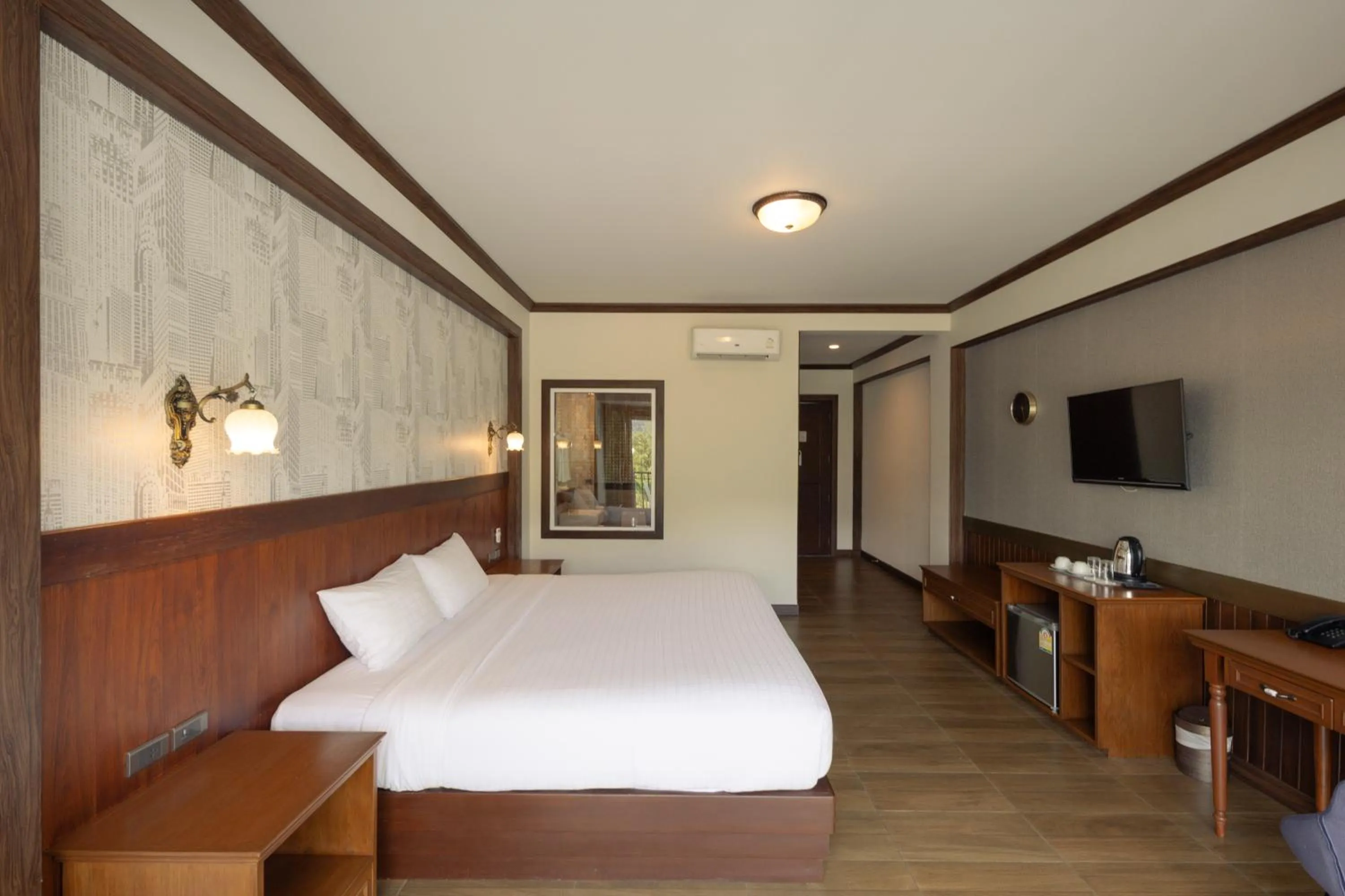 Bed in Le Erawan Phang Nga Hotel