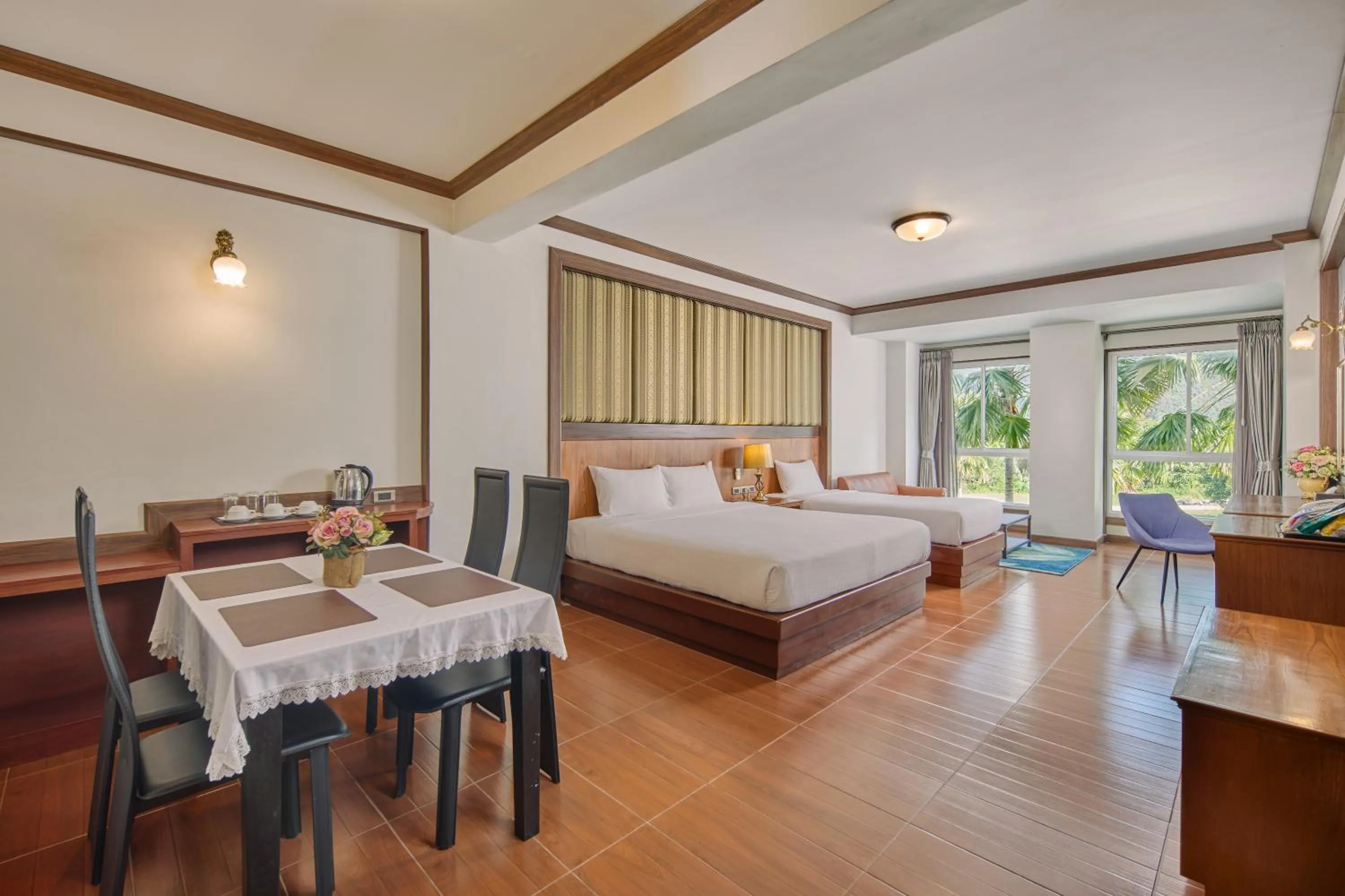 Bed in Le Erawan Phang Nga Hotel