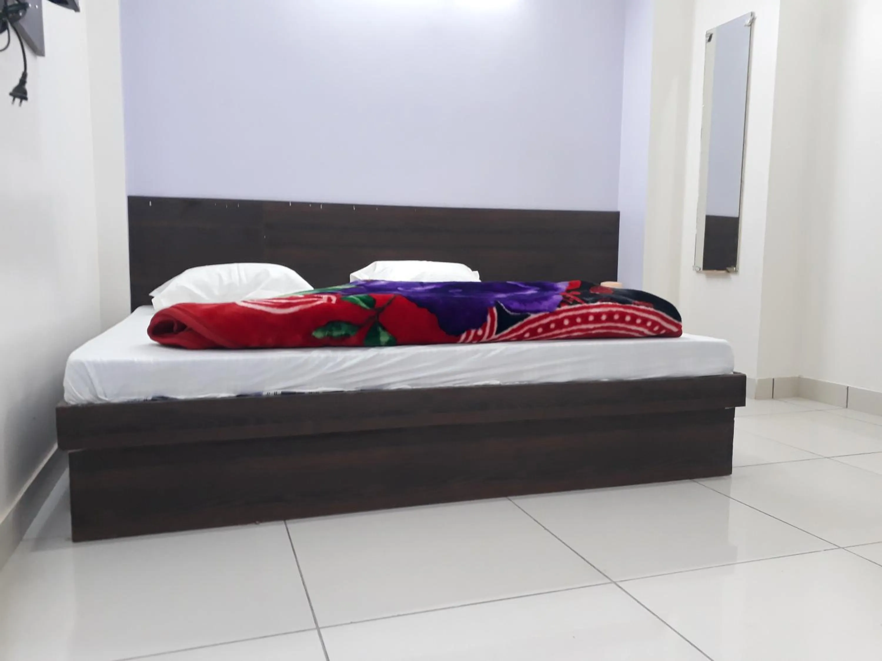 Bed in Hotel Chouhan Paradise
