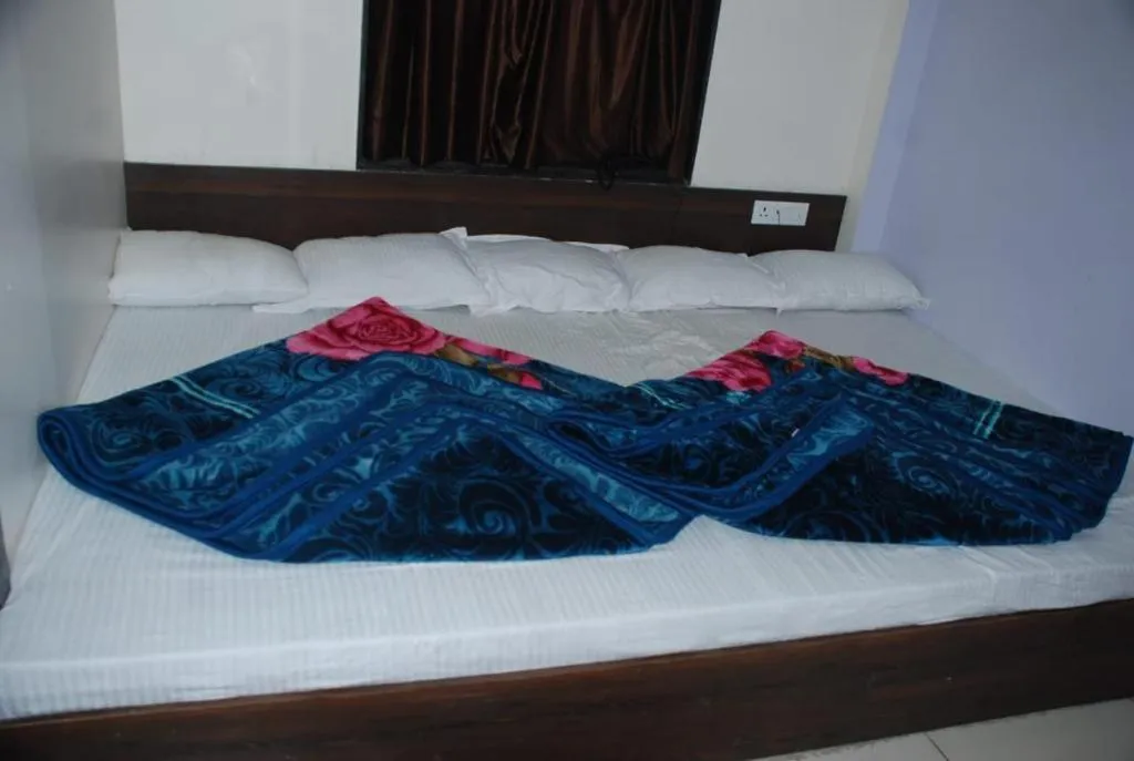 Bed in Hotel Chouhan Paradise