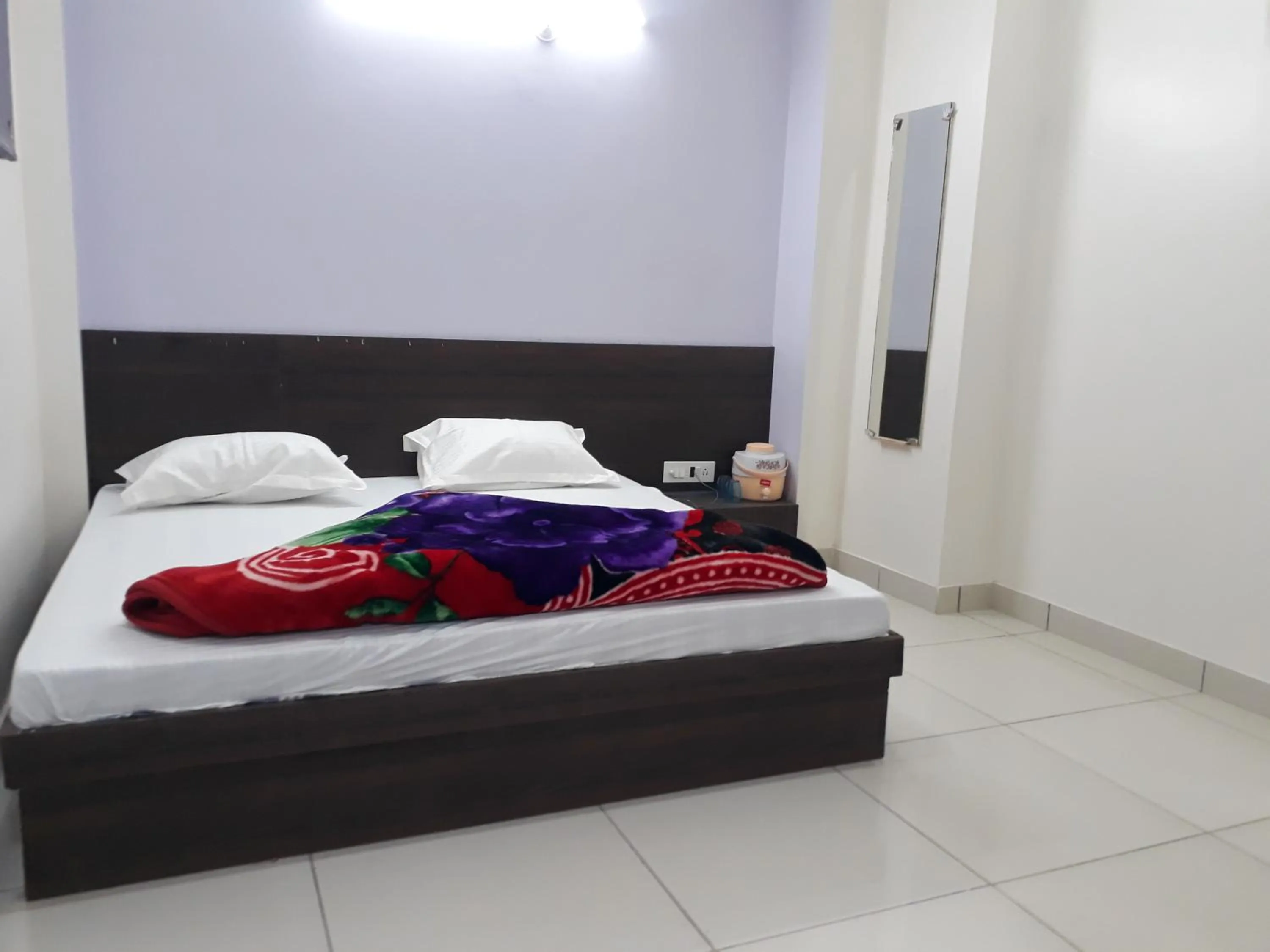 Bed in Hotel Chouhan Paradise