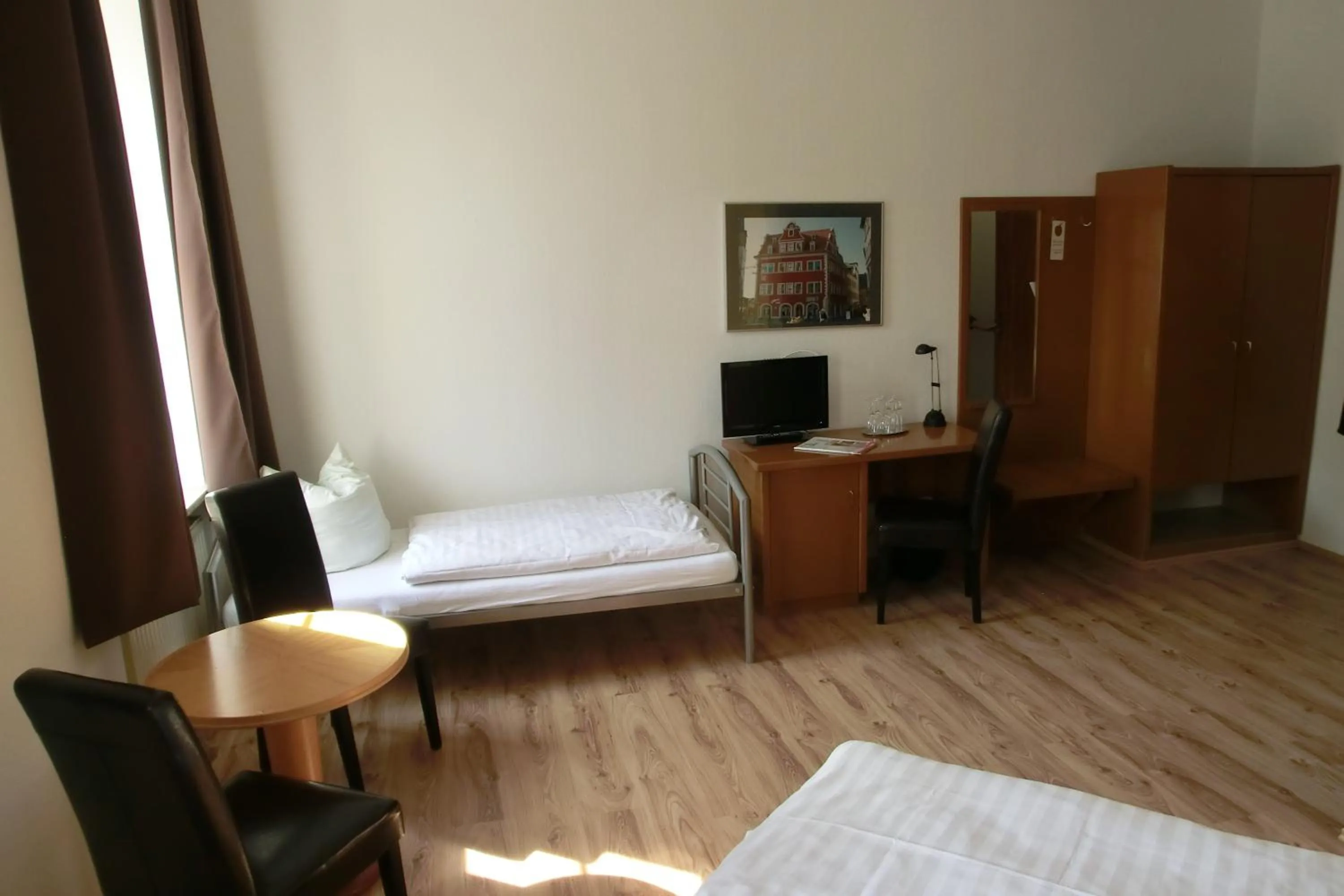 Photo of the whole room, Bed in Hotel Schweizer Hof