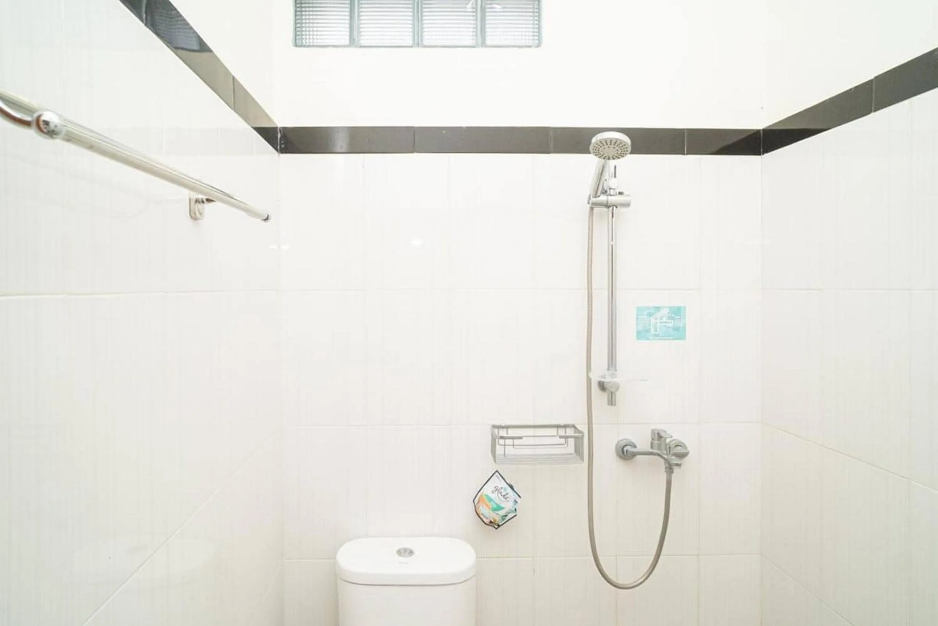 Bathroom in RedDoorz Syariah At Mitra Guest House