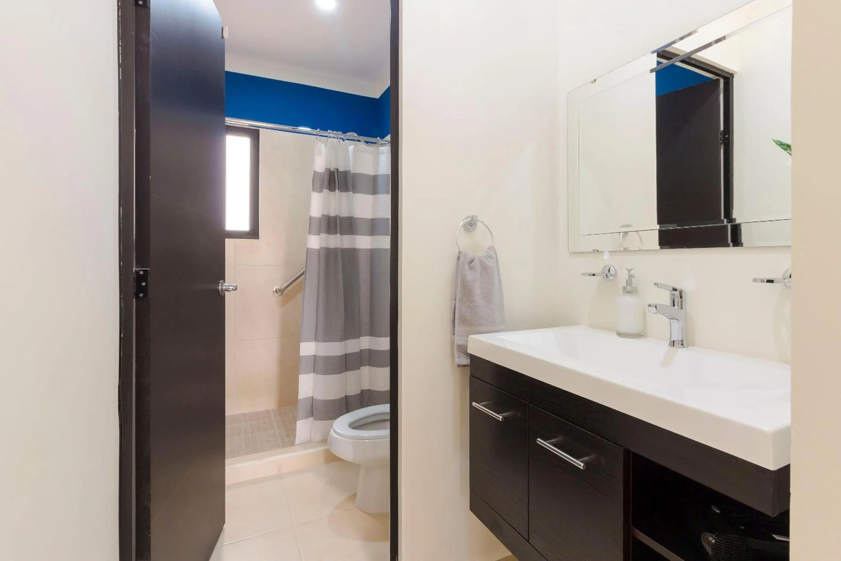 Toilet in Bright & Relaxing Full Apartment