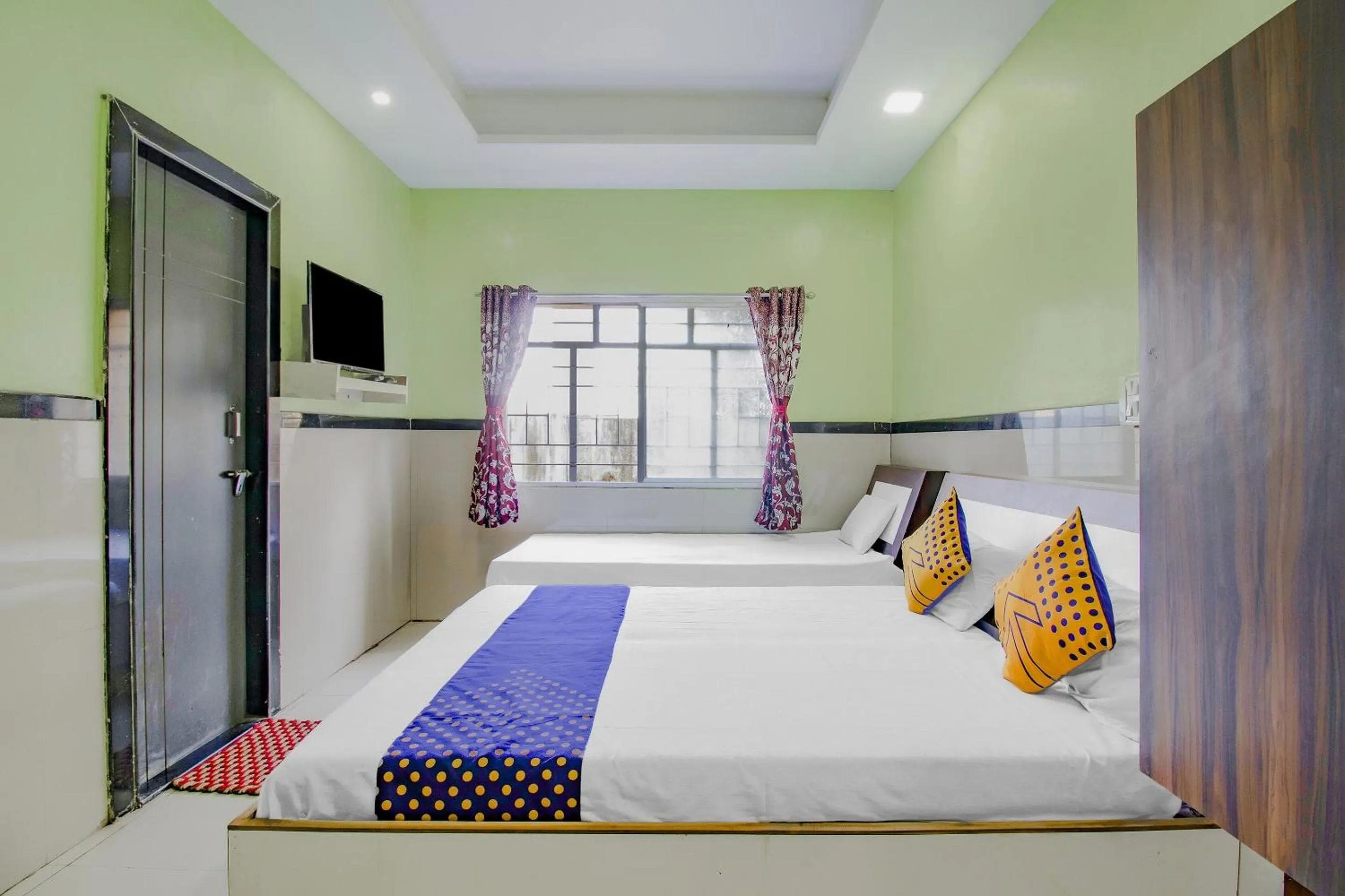 Bedroom, Bed in SPOT ON Indirasagar Executive