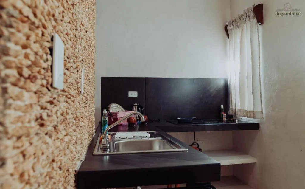 kitchen in Hotel Boutique Bugambilias