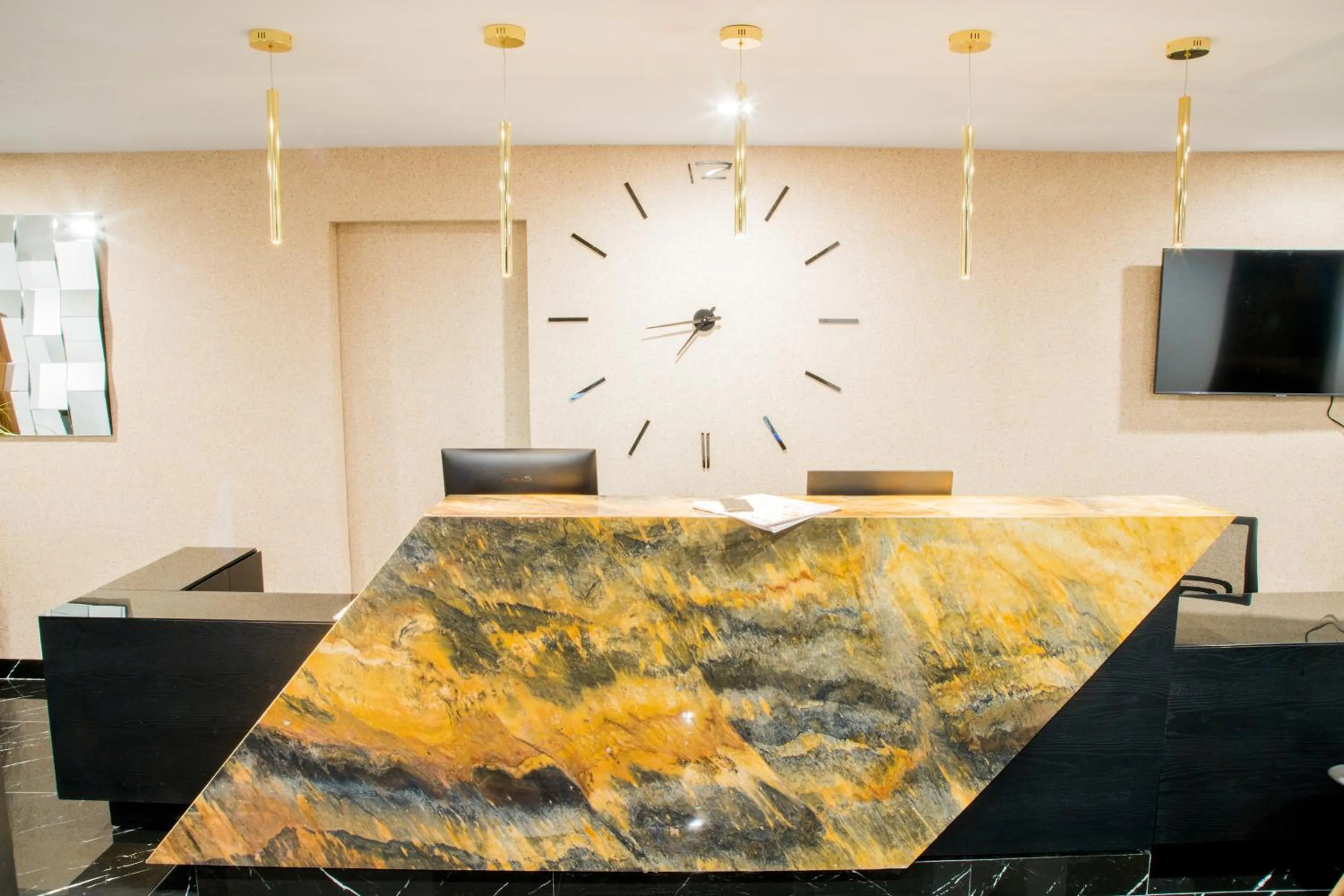 Lobby or reception in Ramë Hotel Boutique