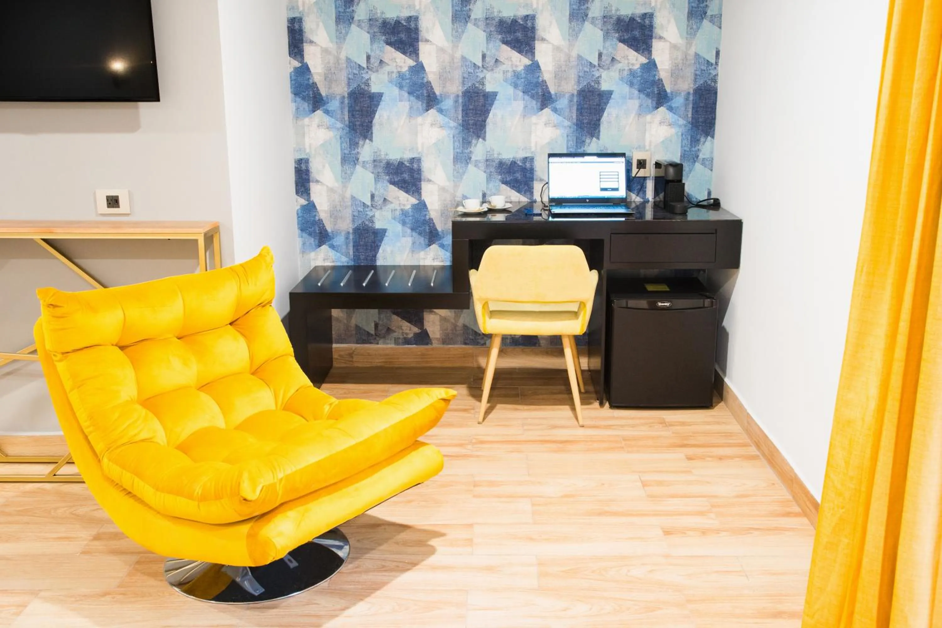 Seating area in Ramë Hotel Boutique