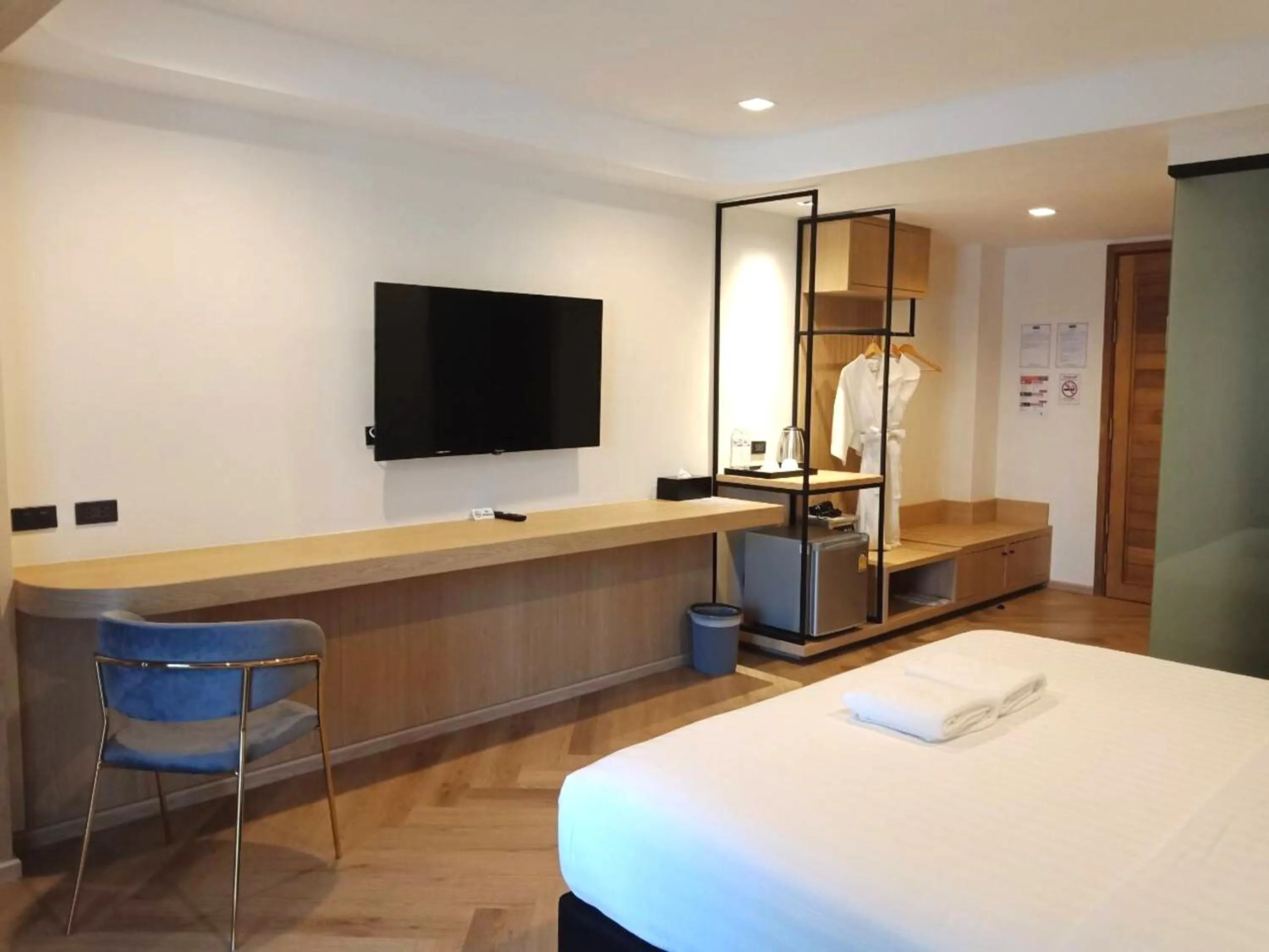 Communal lounge/ TV room, Bed in Sann Boutique Hotel