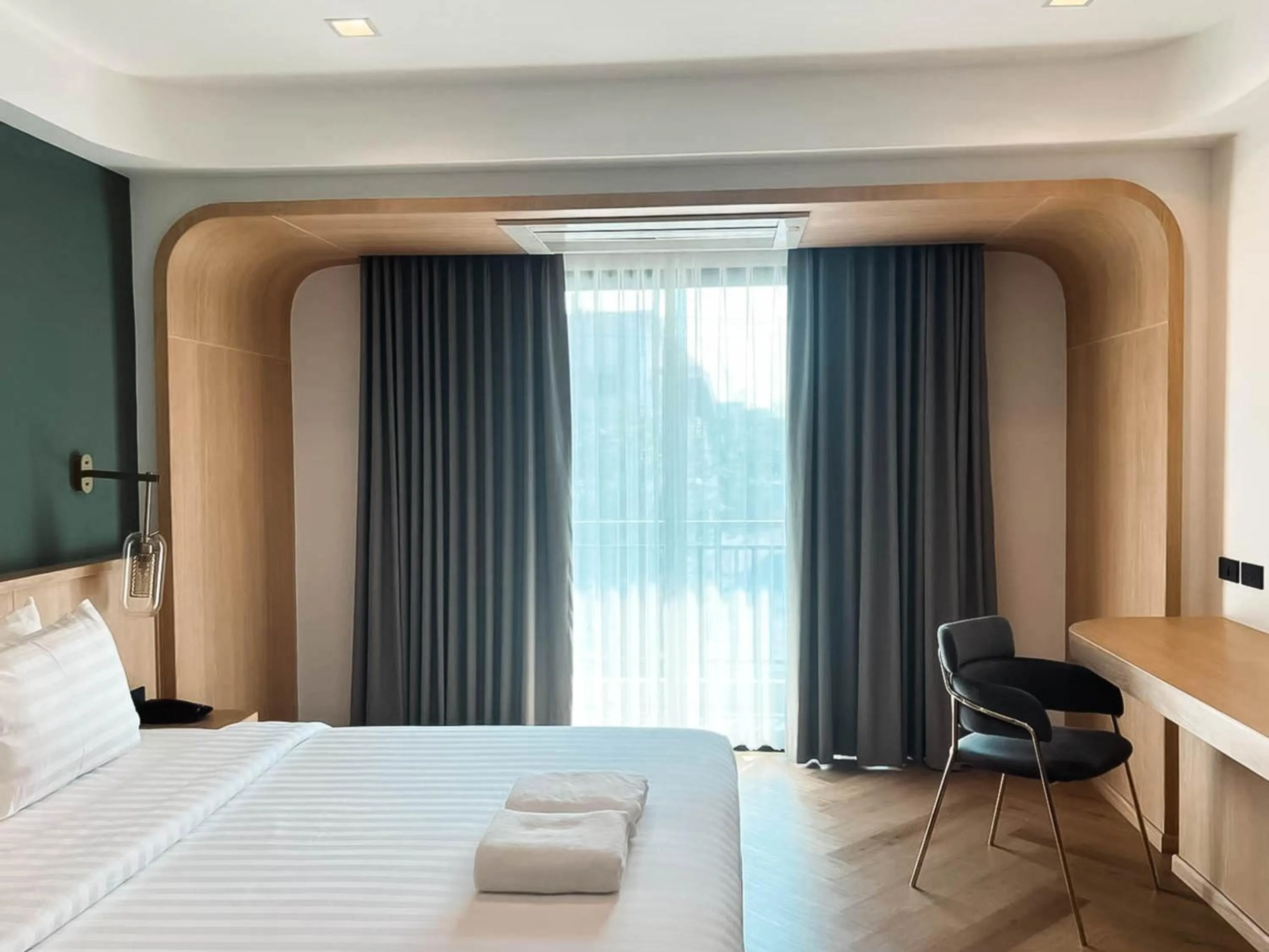 Communal lounge/ TV room, Bed in Sann Boutique Hotel