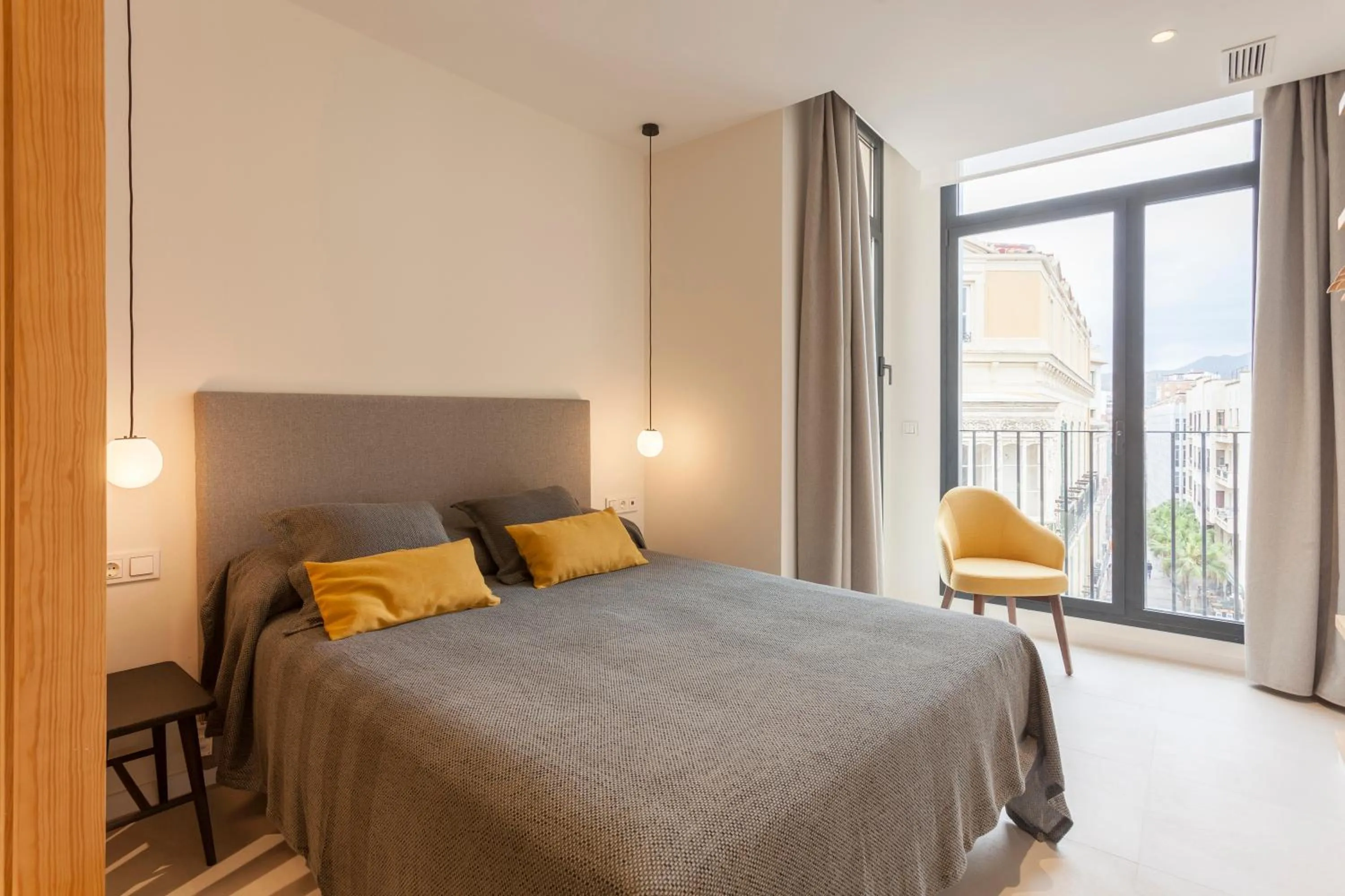 Bed in Apartamentos Málaga Premium - Calle Granada