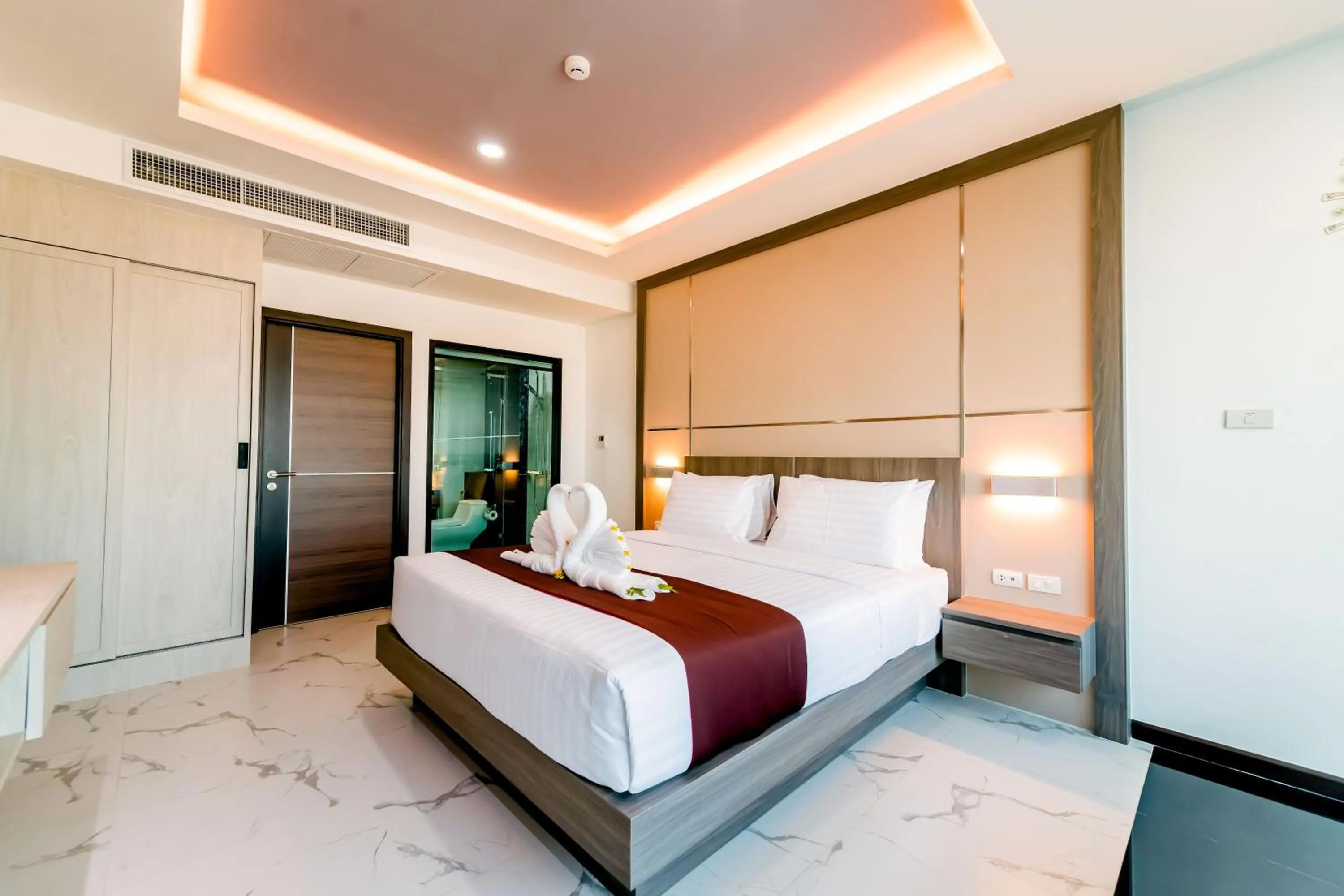 Bed in The Proud Hotel Pattaya - SHA Certified