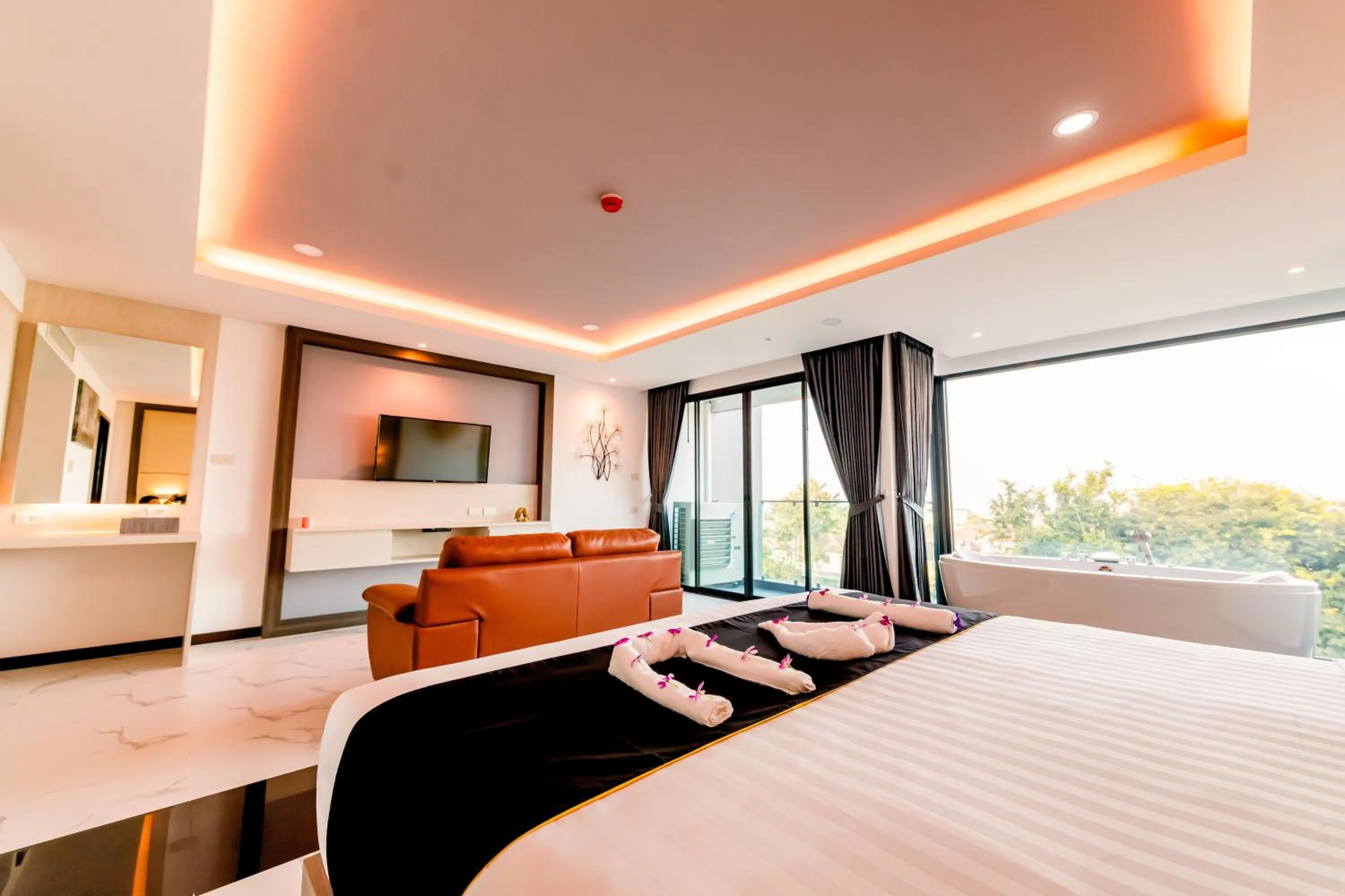 Bed in The Proud Hotel Pattaya - SHA Certified