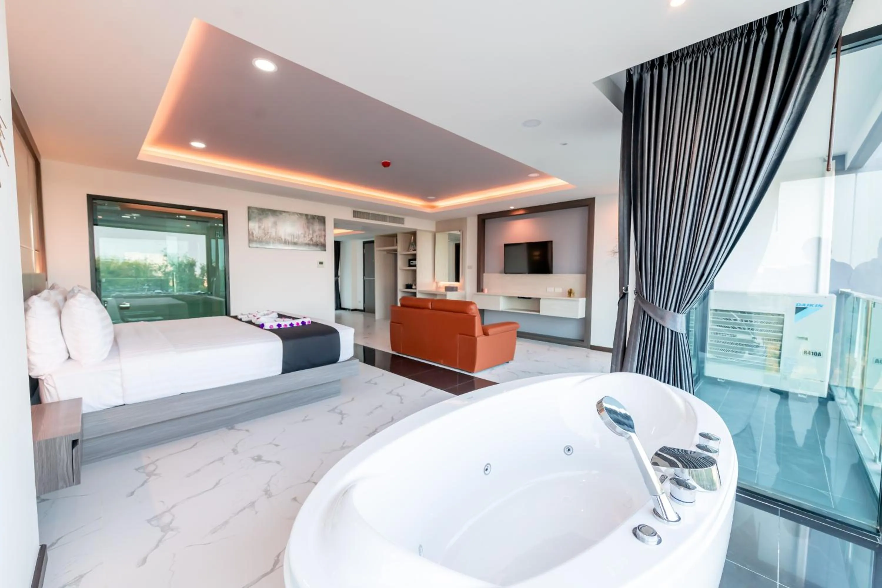 Bed in The Proud Hotel Pattaya - SHA Certified