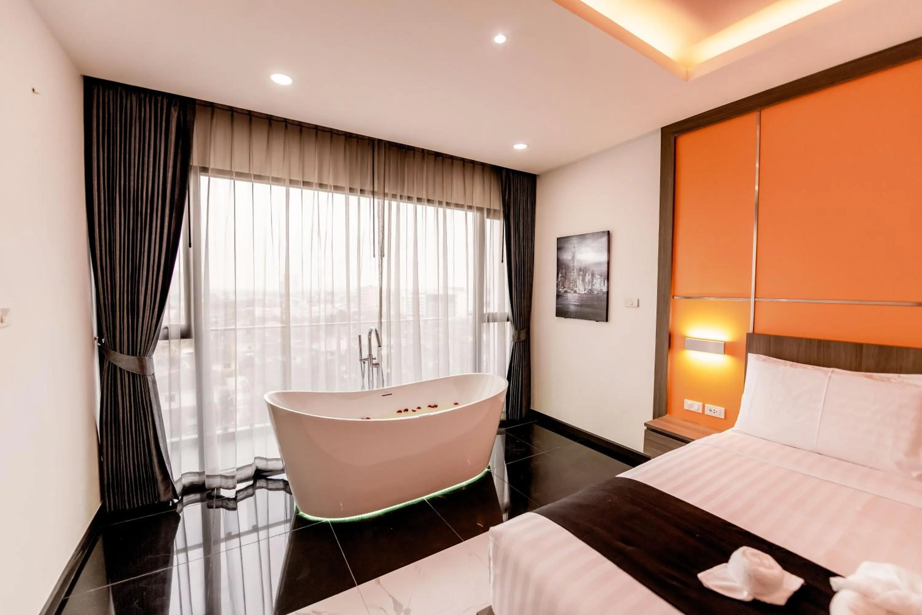 Bed in The Proud Hotel Pattaya - SHA Certified