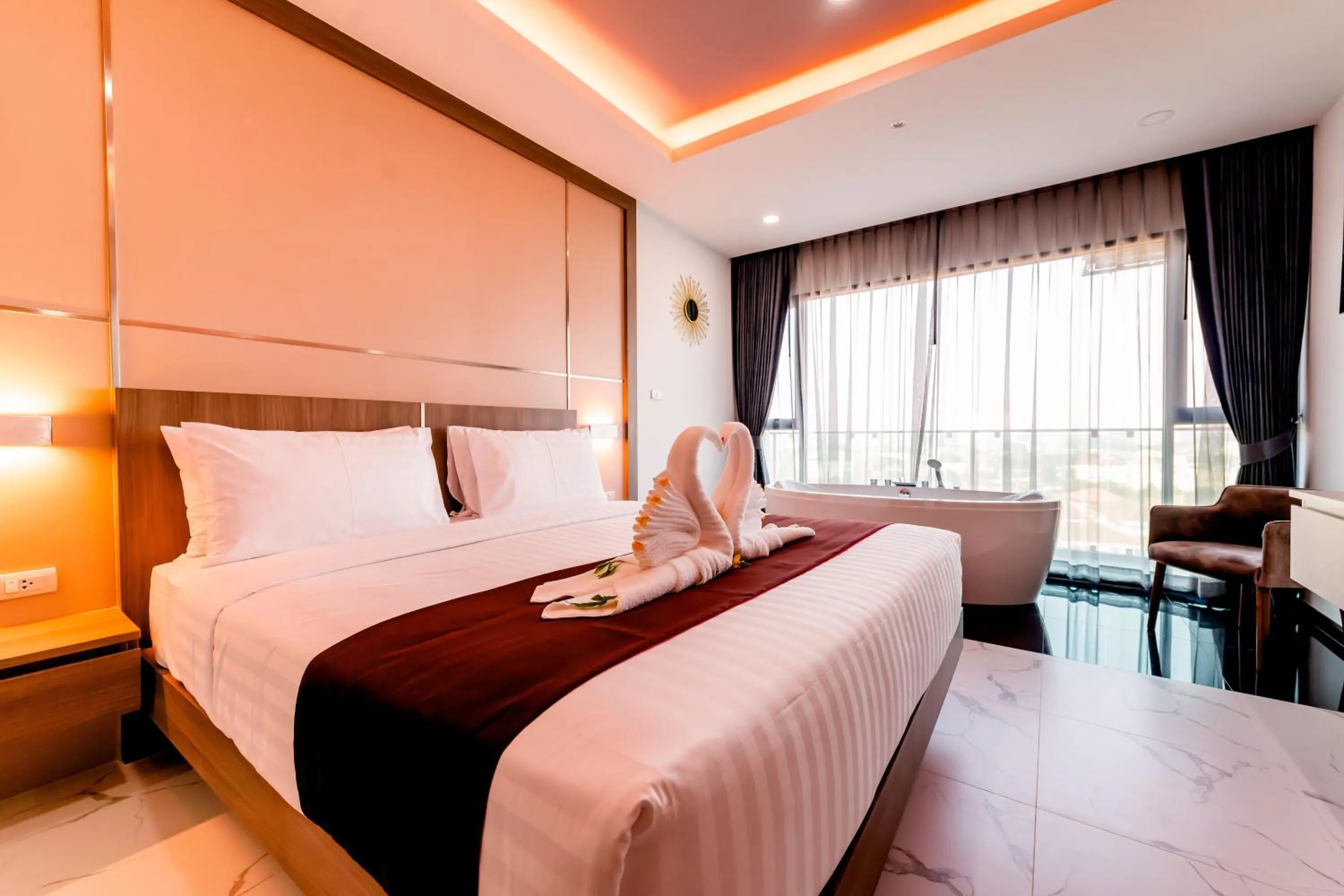 Bed in The Proud Hotel Pattaya - SHA Certified