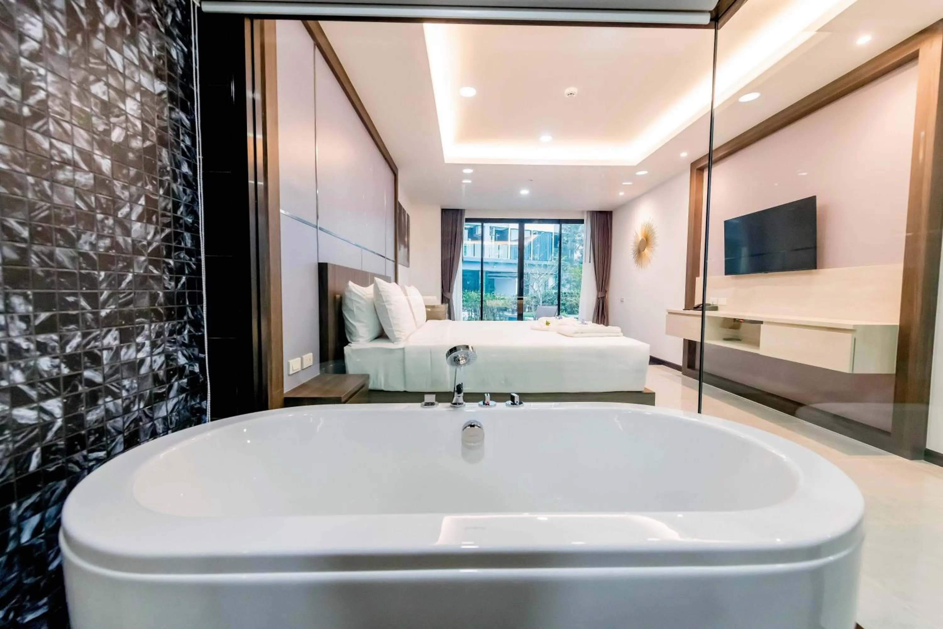 Bed in The Proud Hotel Pattaya - SHA Certified