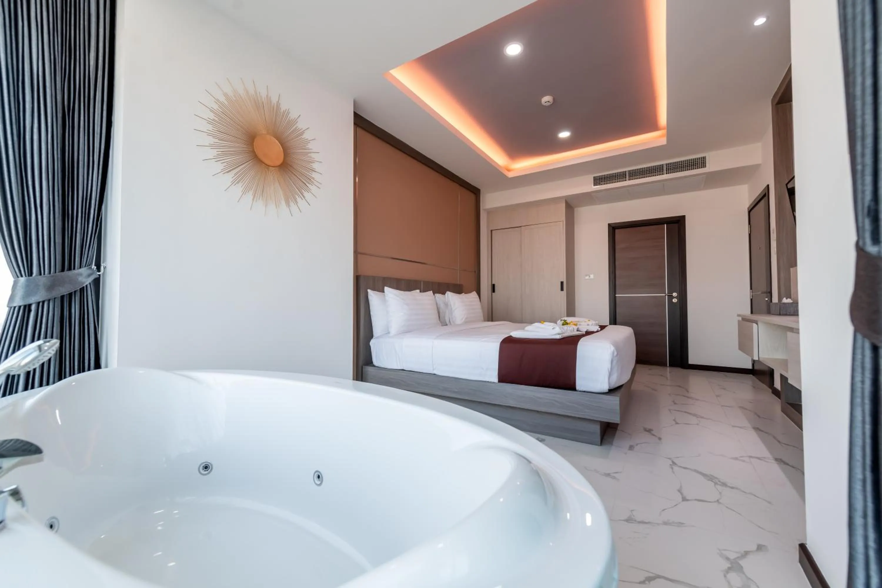 Bed in The Proud Hotel Pattaya - SHA Certified