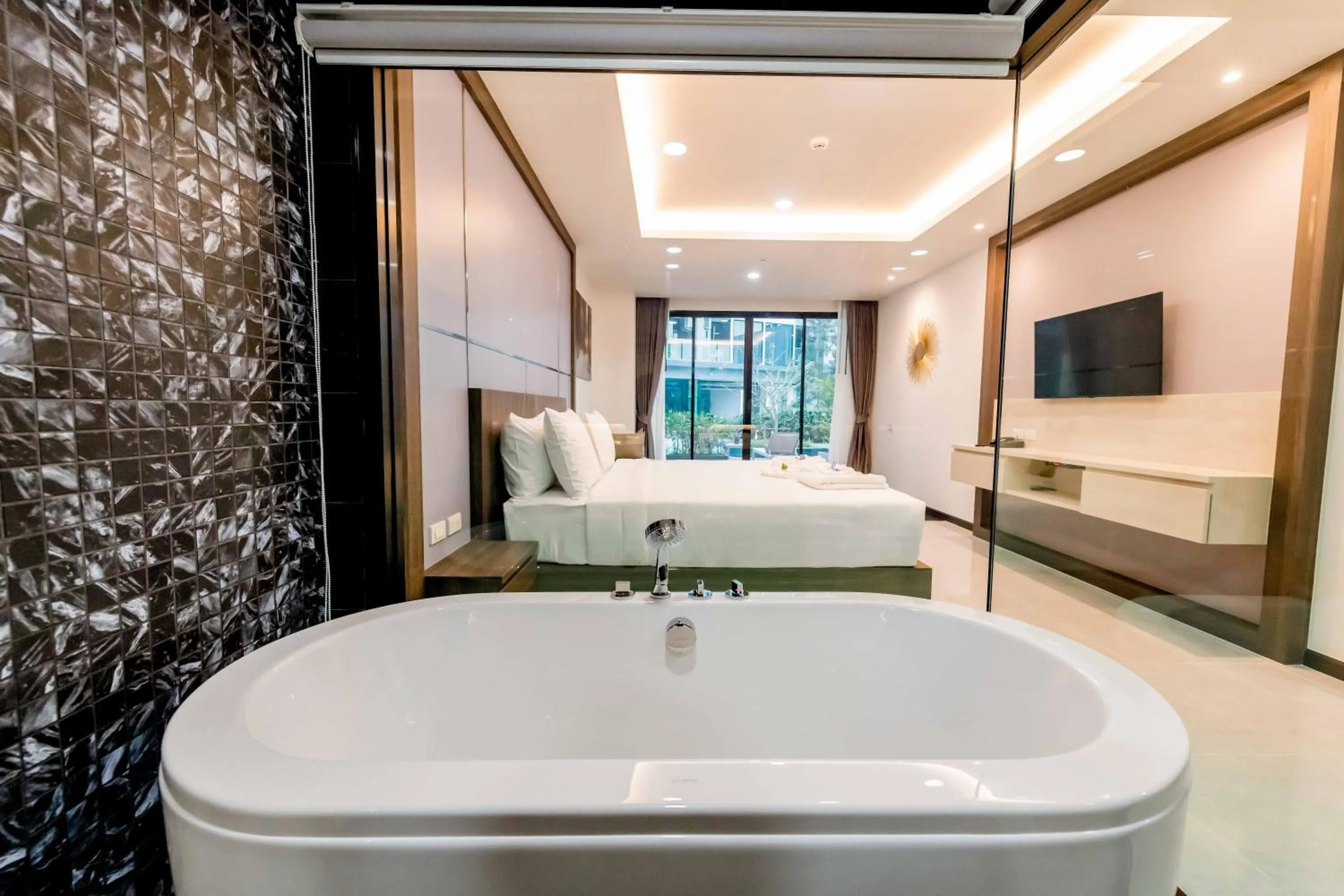 Bed in The Proud Hotel Pattaya - SHA Certified