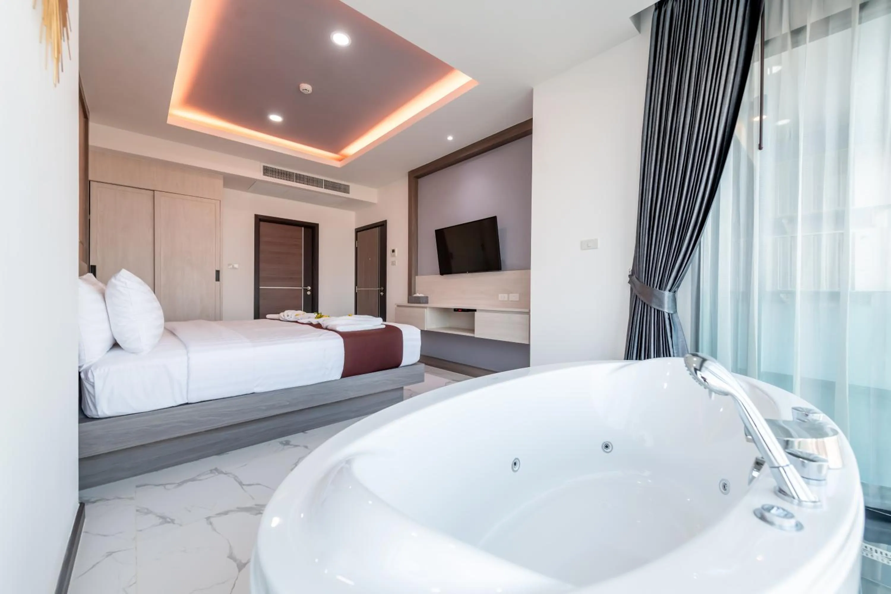 Bed in The Proud Hotel Pattaya - SHA Certified