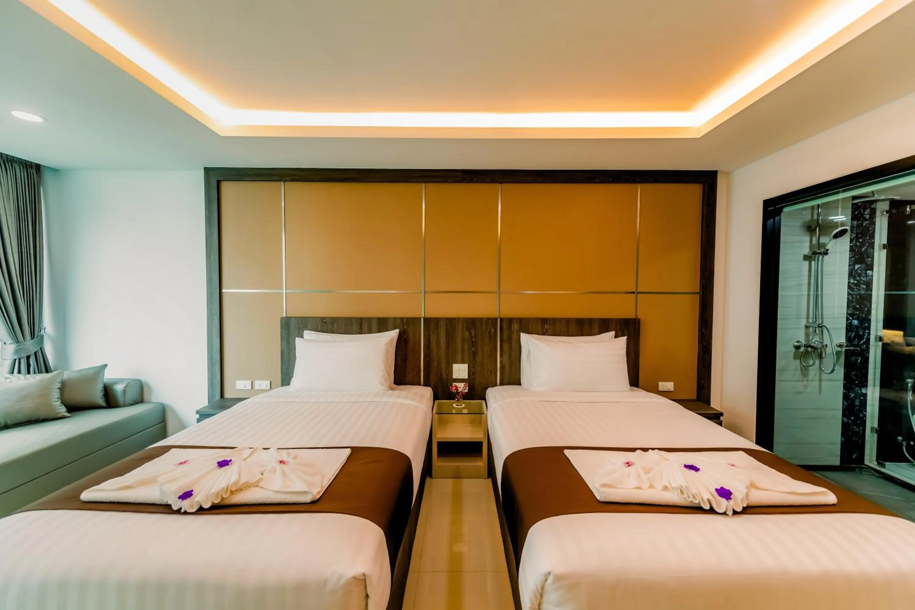 Bed in The Proud Hotel Pattaya - SHA Certified