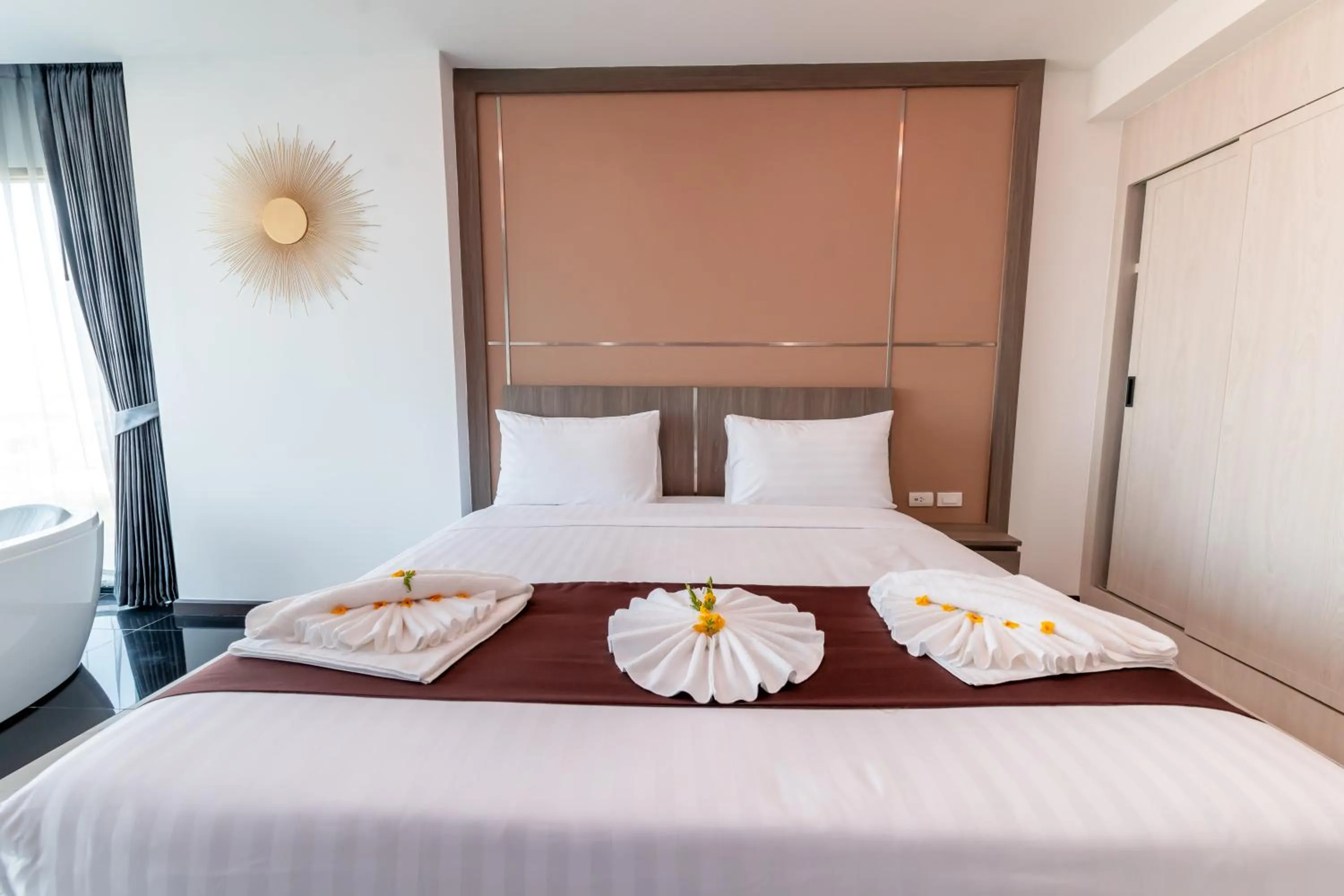 Bed in The Proud Hotel Pattaya - SHA Certified