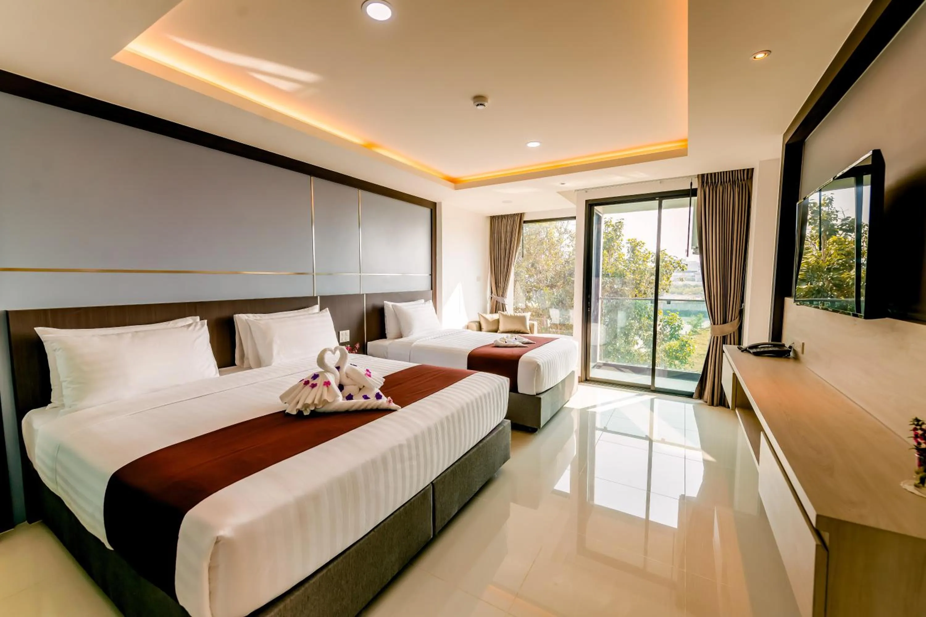 Bed in The Proud Hotel Pattaya - SHA Certified