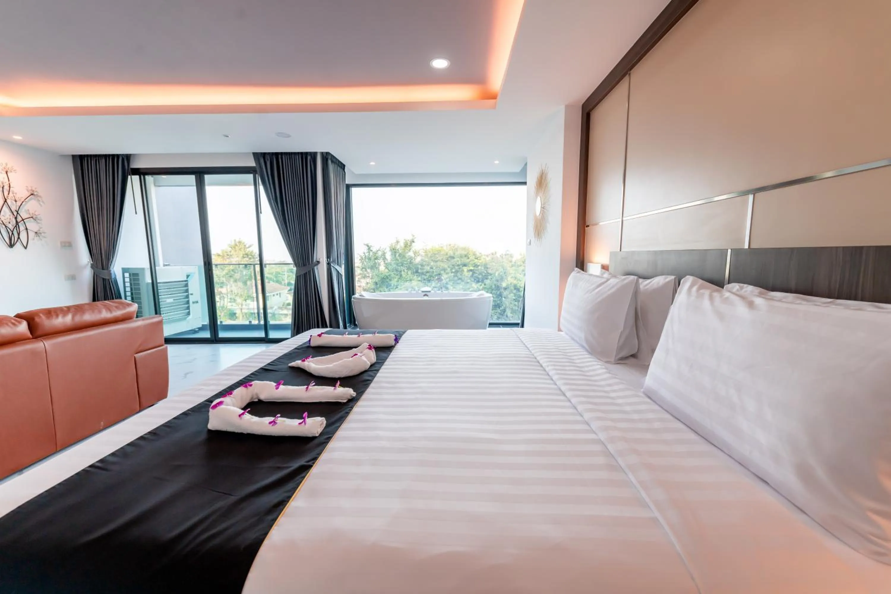 Bed in The Proud Hotel Pattaya - SHA Certified