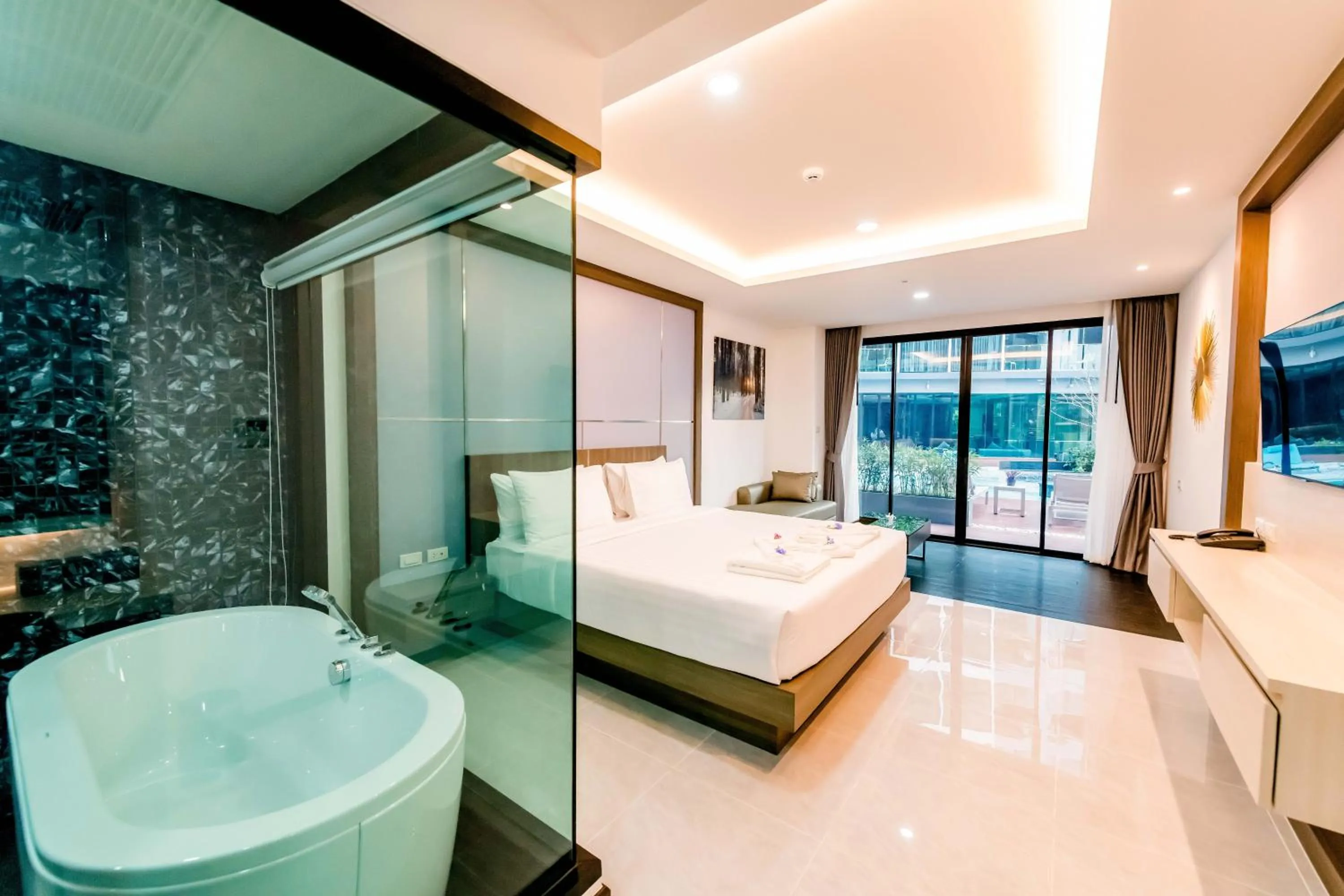 Bed in The Proud Hotel Pattaya - SHA Certified