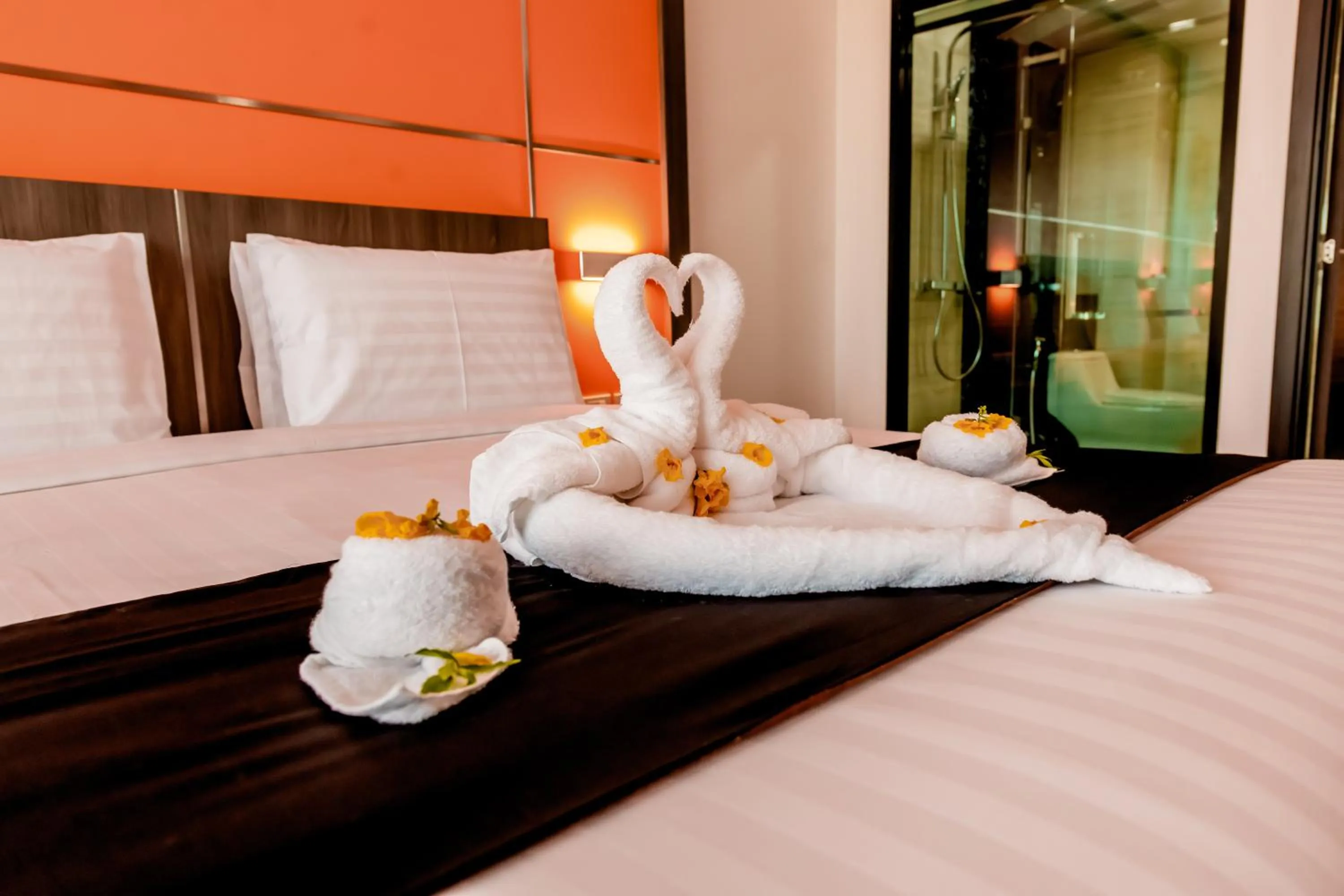 Bed in The Proud Hotel Pattaya - SHA Certified