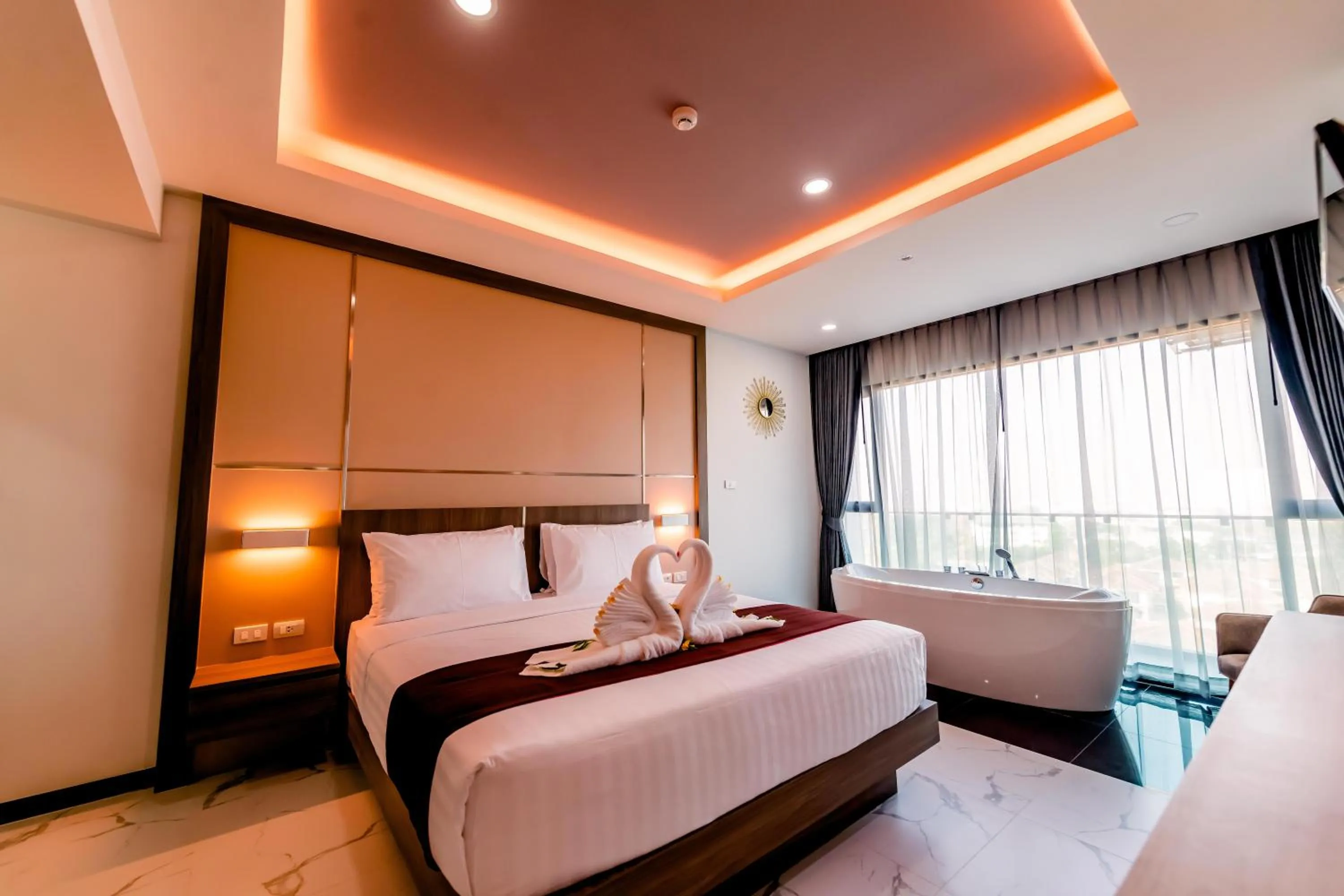 Bed in The Proud Hotel Pattaya - SHA Certified