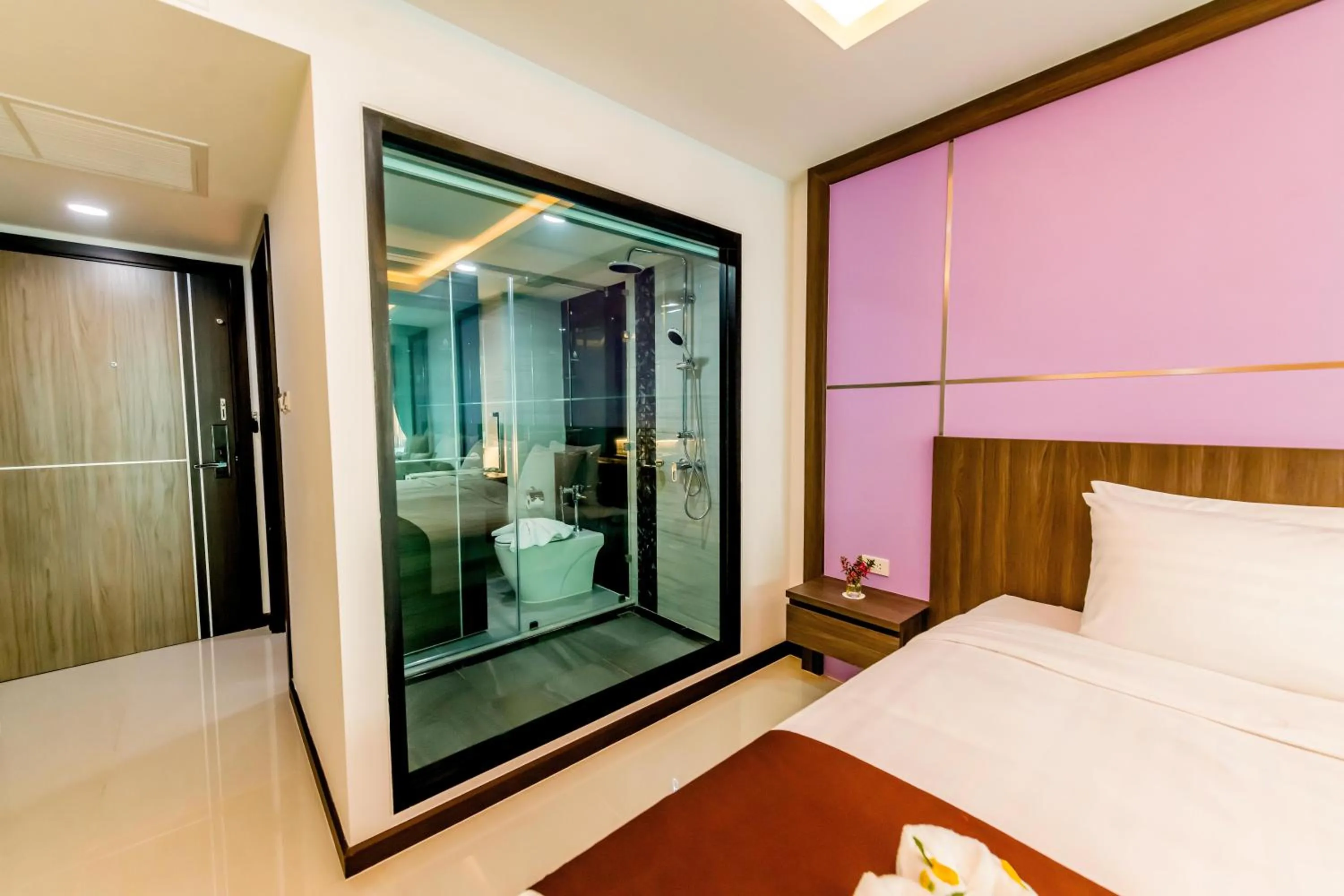 Bed in The Proud Hotel Pattaya - SHA Certified