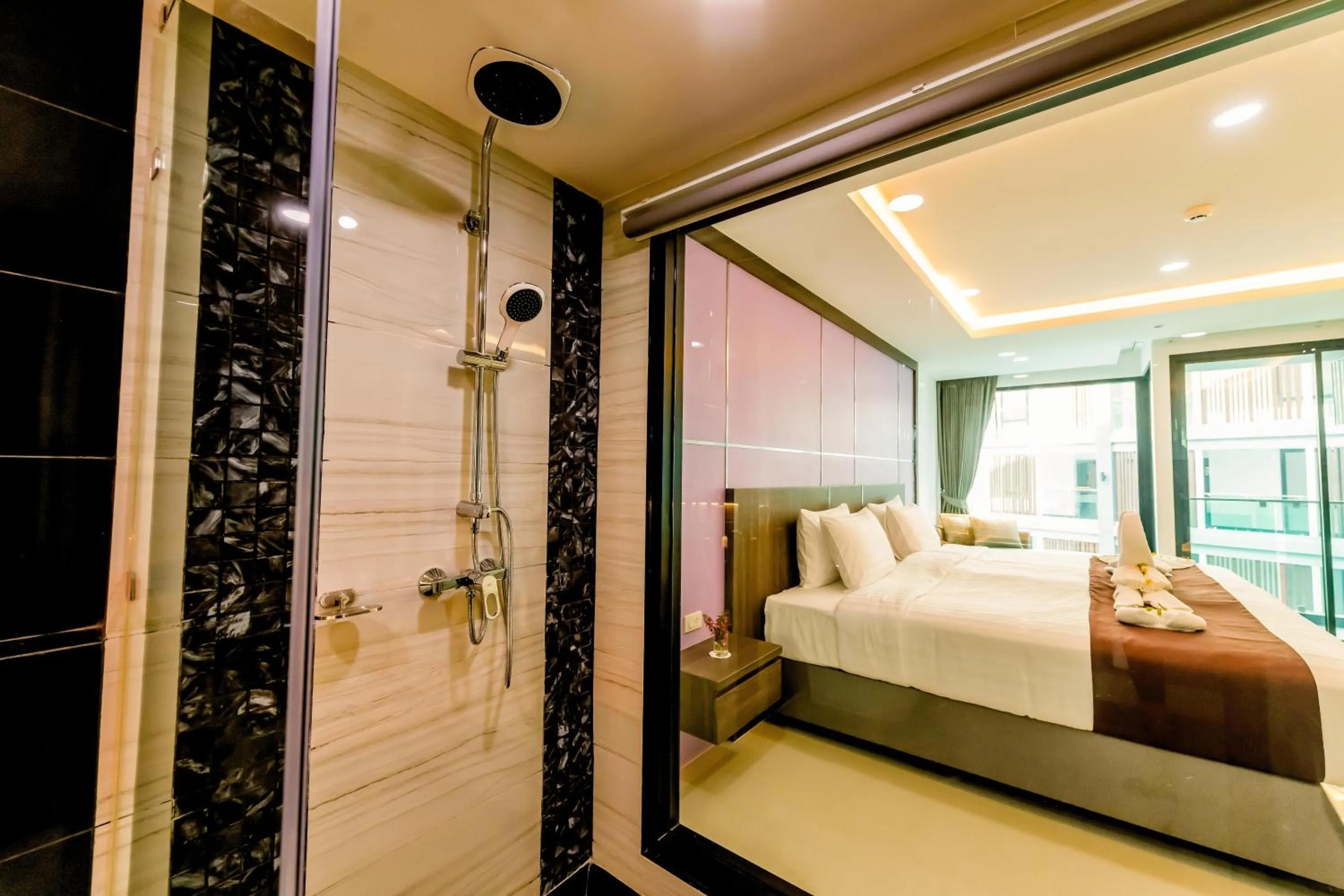 Bed in The Proud Hotel Pattaya - SHA Certified