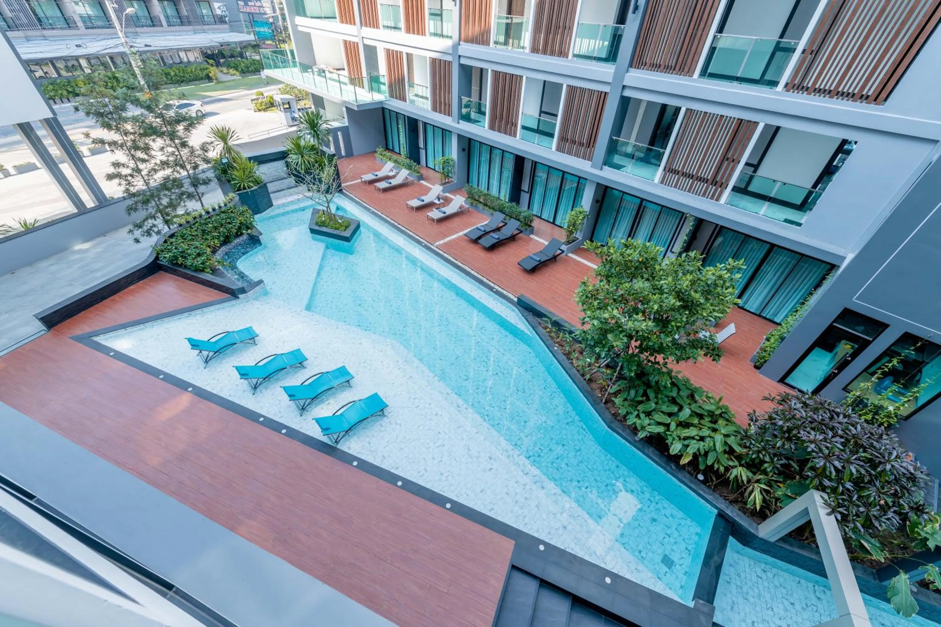 Swimming pool in The Proud Hotel Pattaya - SHA Certified