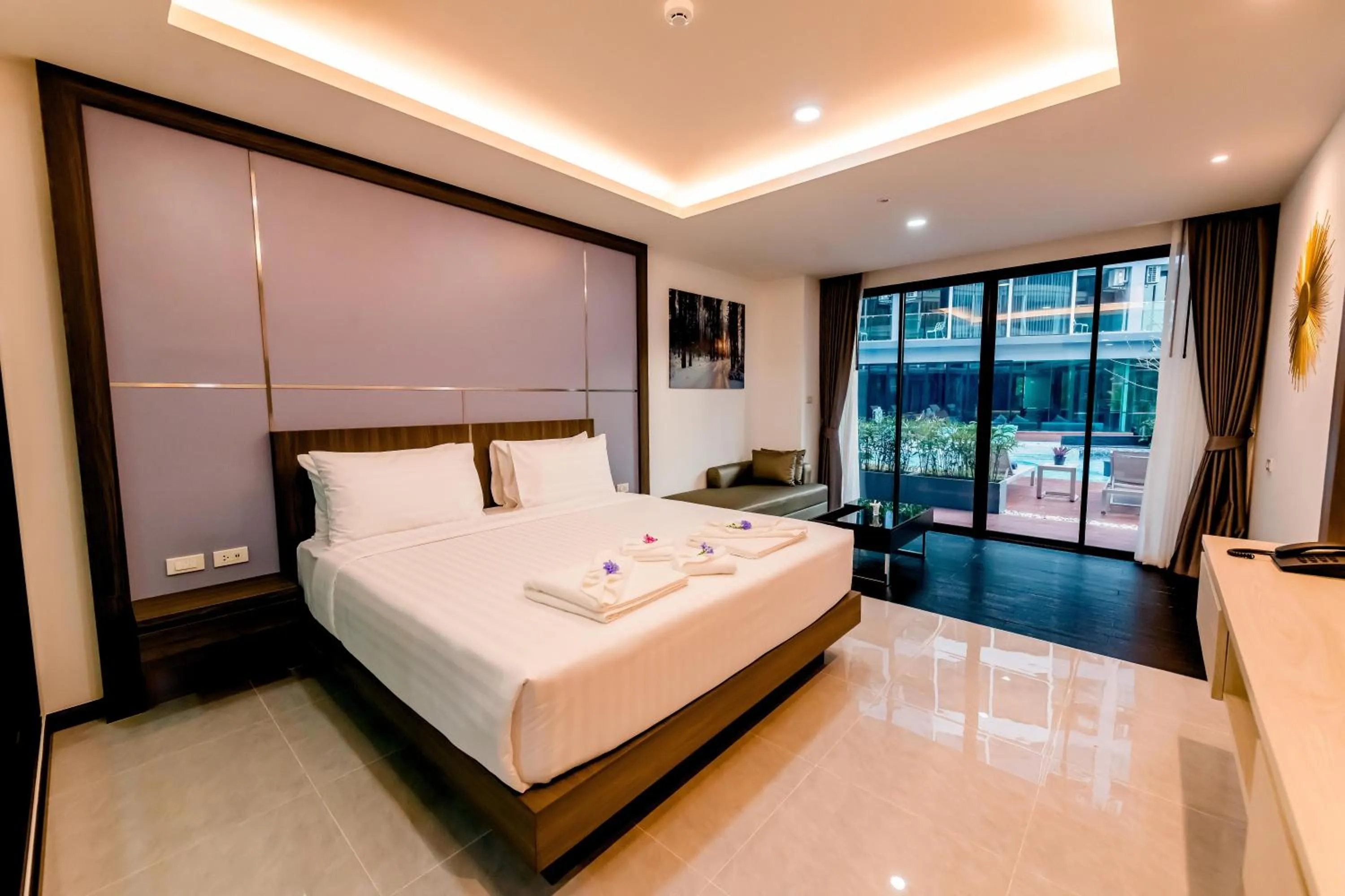 Bed in The Proud Hotel Pattaya - SHA Certified