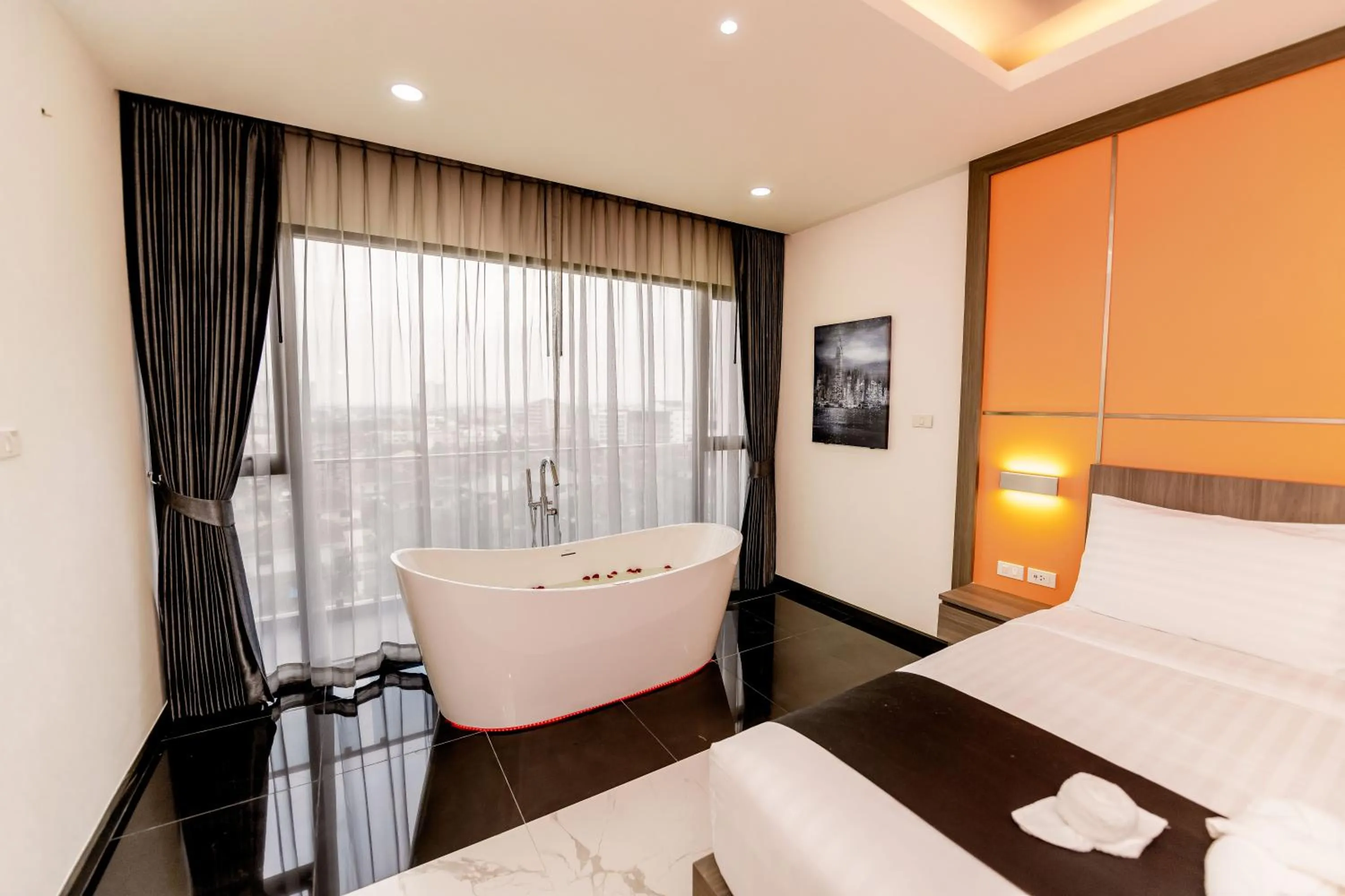 Bed in The Proud Hotel Pattaya - SHA Certified