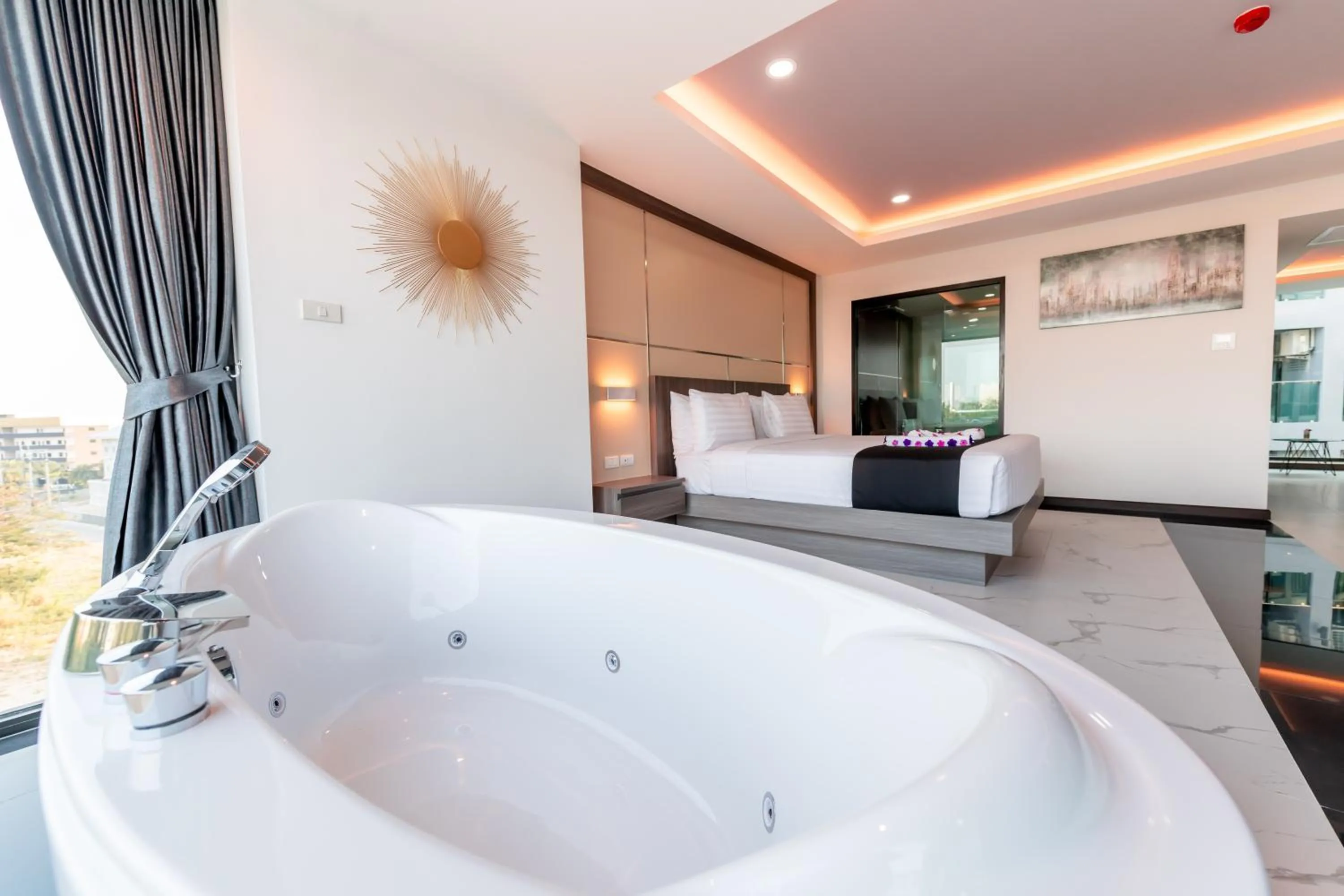 Bed in The Proud Hotel Pattaya - SHA Certified