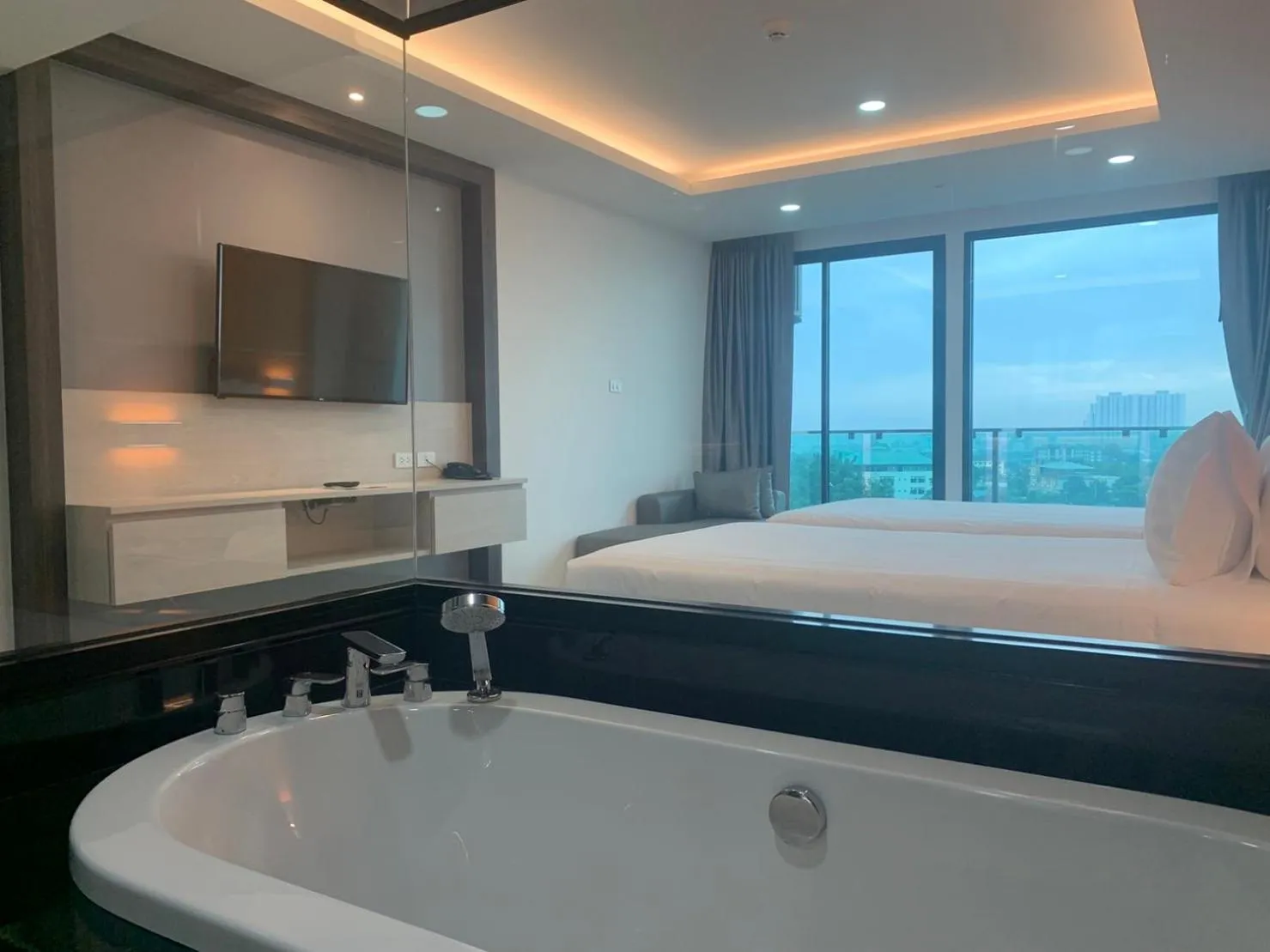City view, Bed in The Proud Hotel Pattaya - SHA Certified
