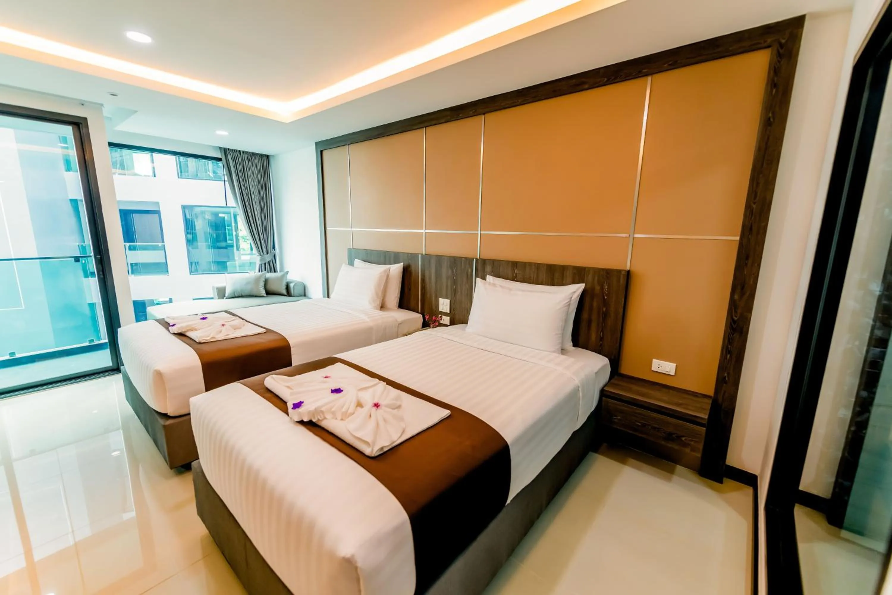 Bed in The Proud Hotel Pattaya - SHA Certified