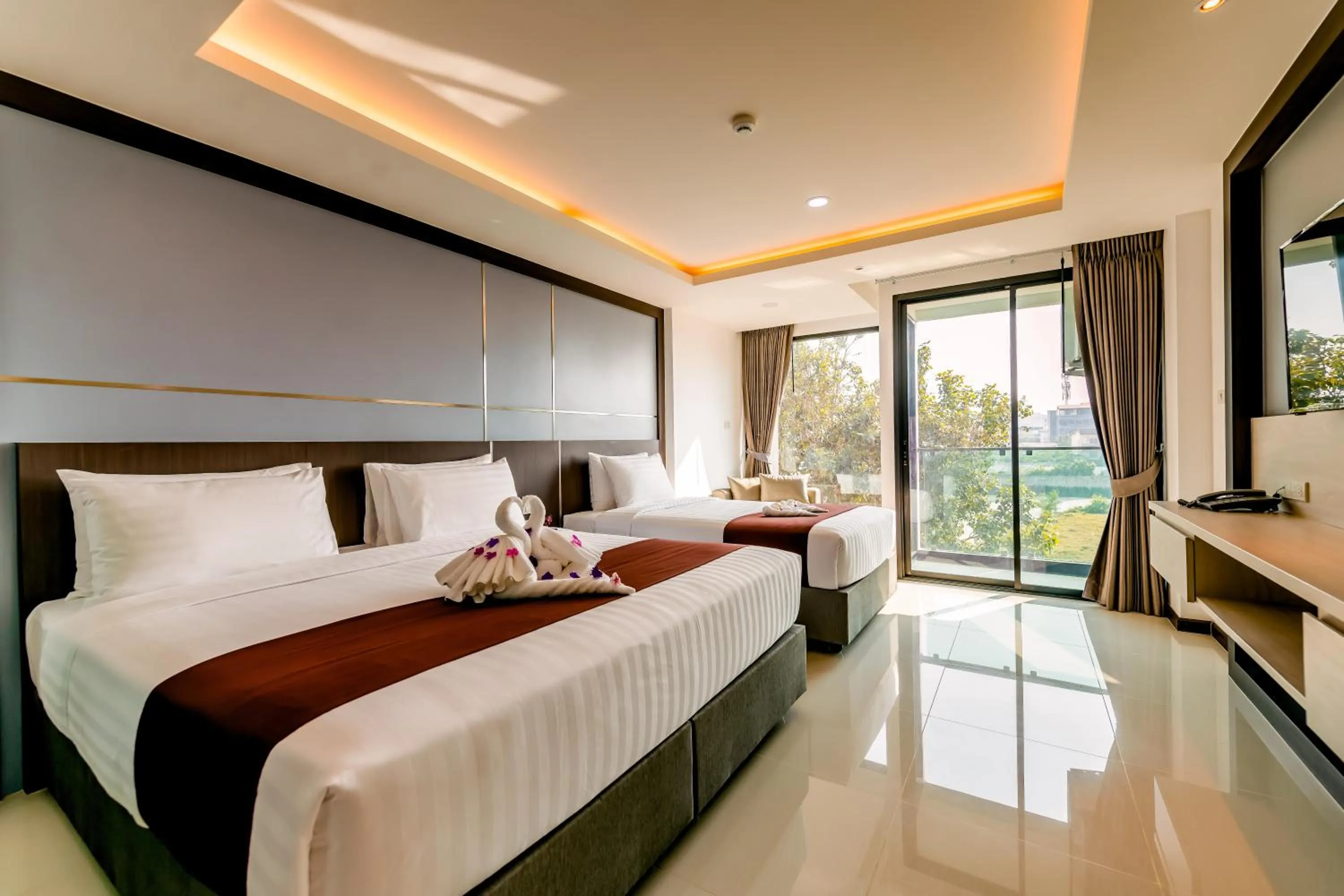 Bed in The Proud Hotel Pattaya - SHA Certified