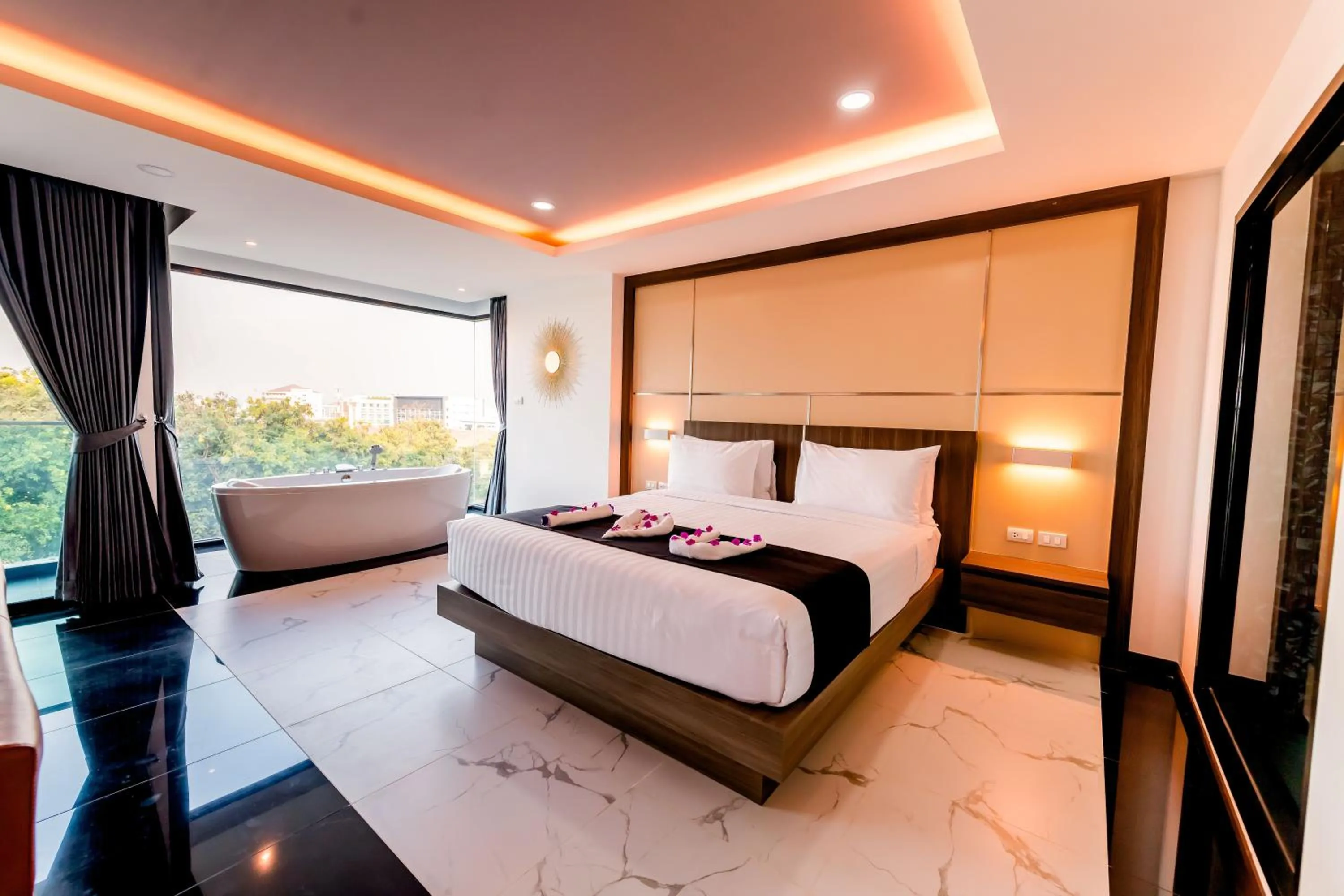 Bed in The Proud Hotel Pattaya - SHA Certified