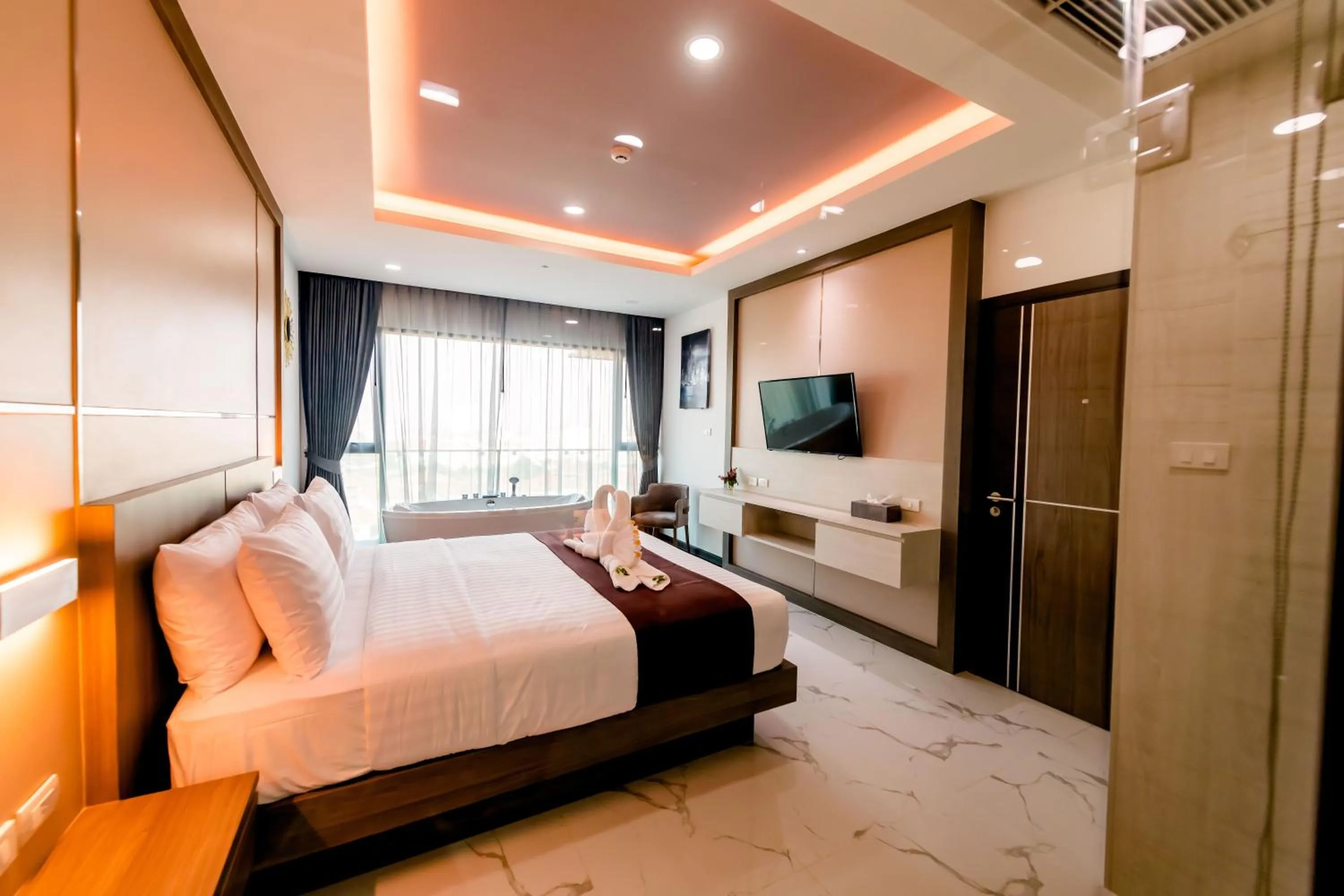 Bed in The Proud Hotel Pattaya - SHA Certified