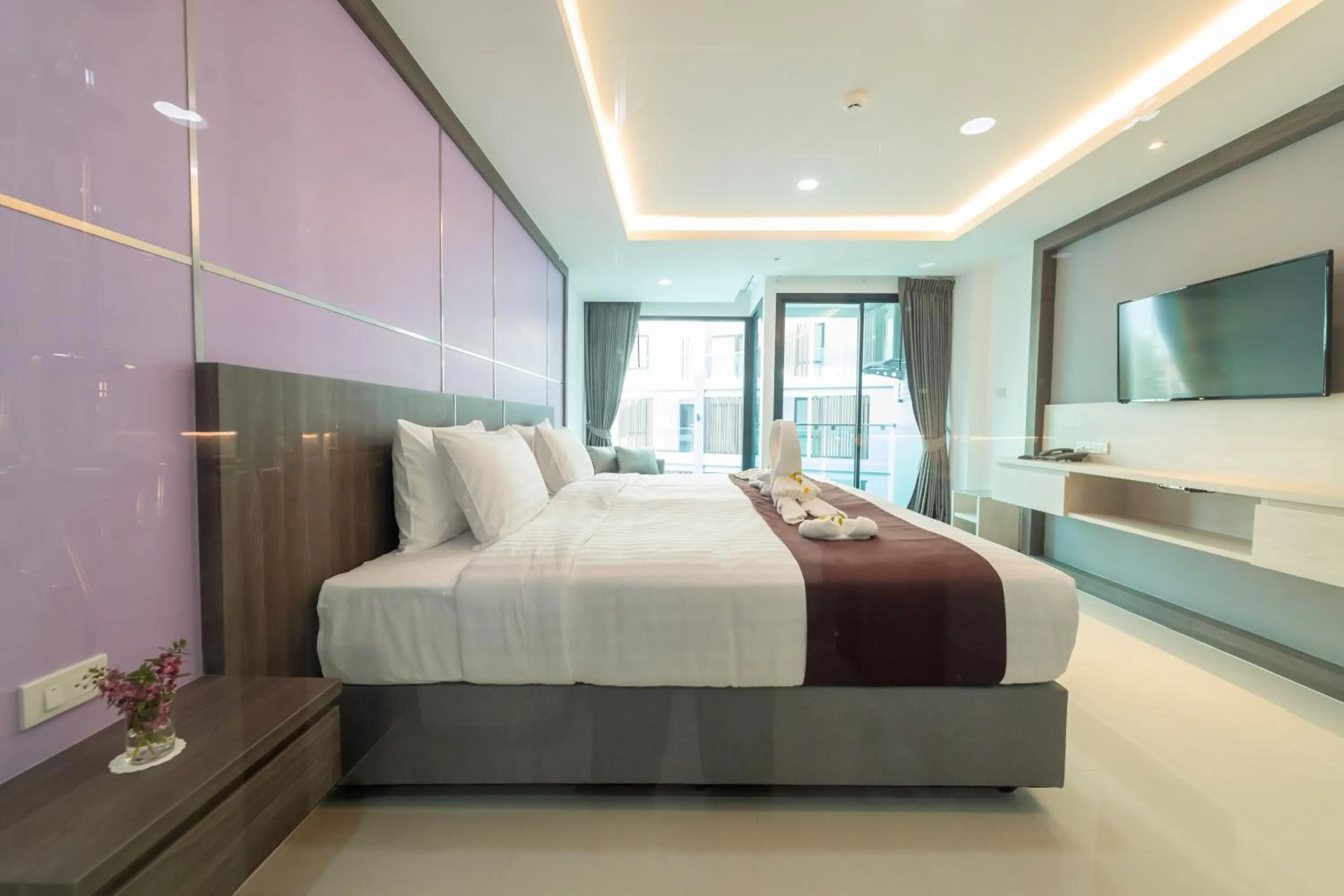 Bed in The Proud Hotel Pattaya - SHA Certified