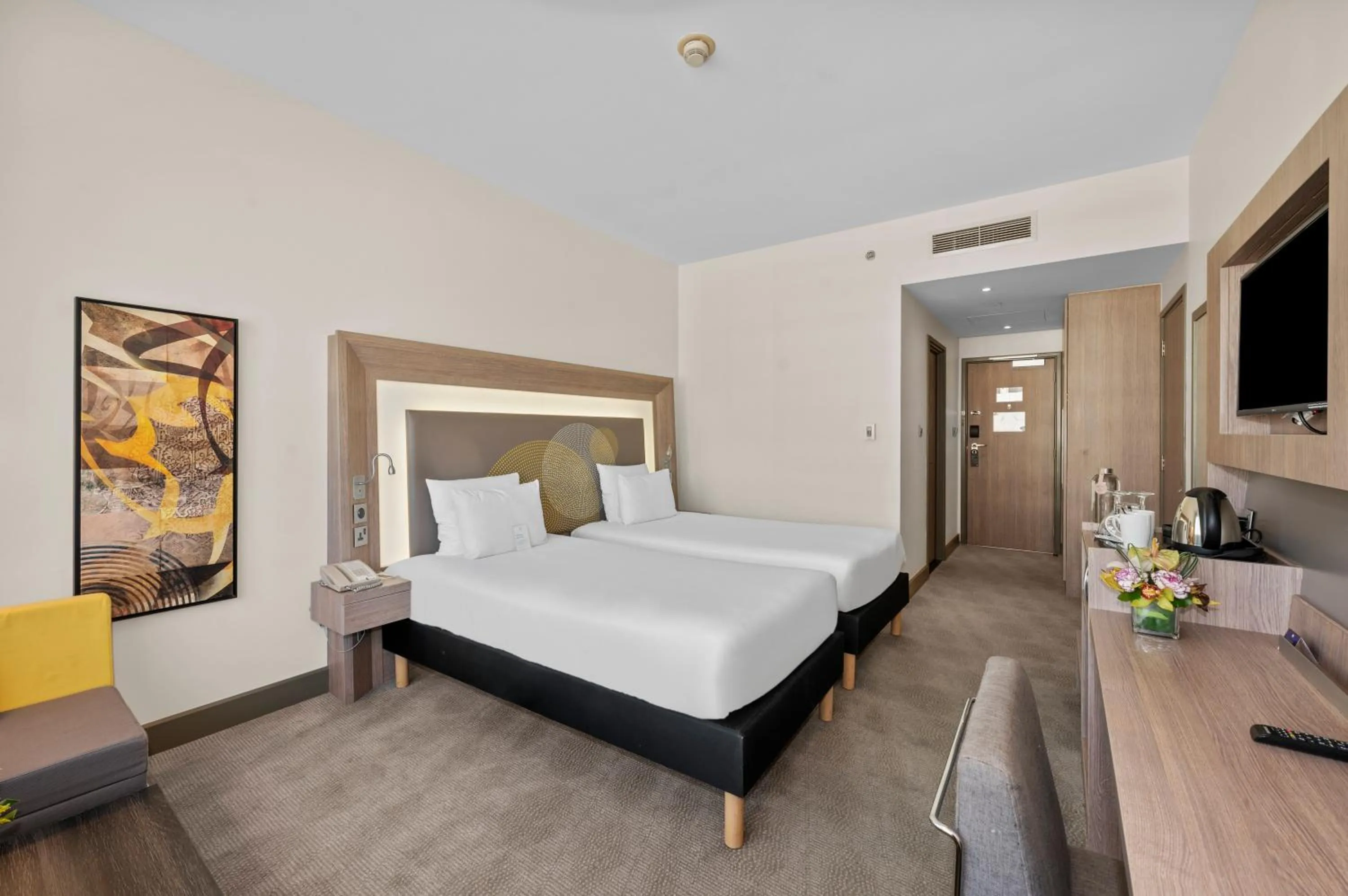 Bed in Novotel Dubai World Trade Centre