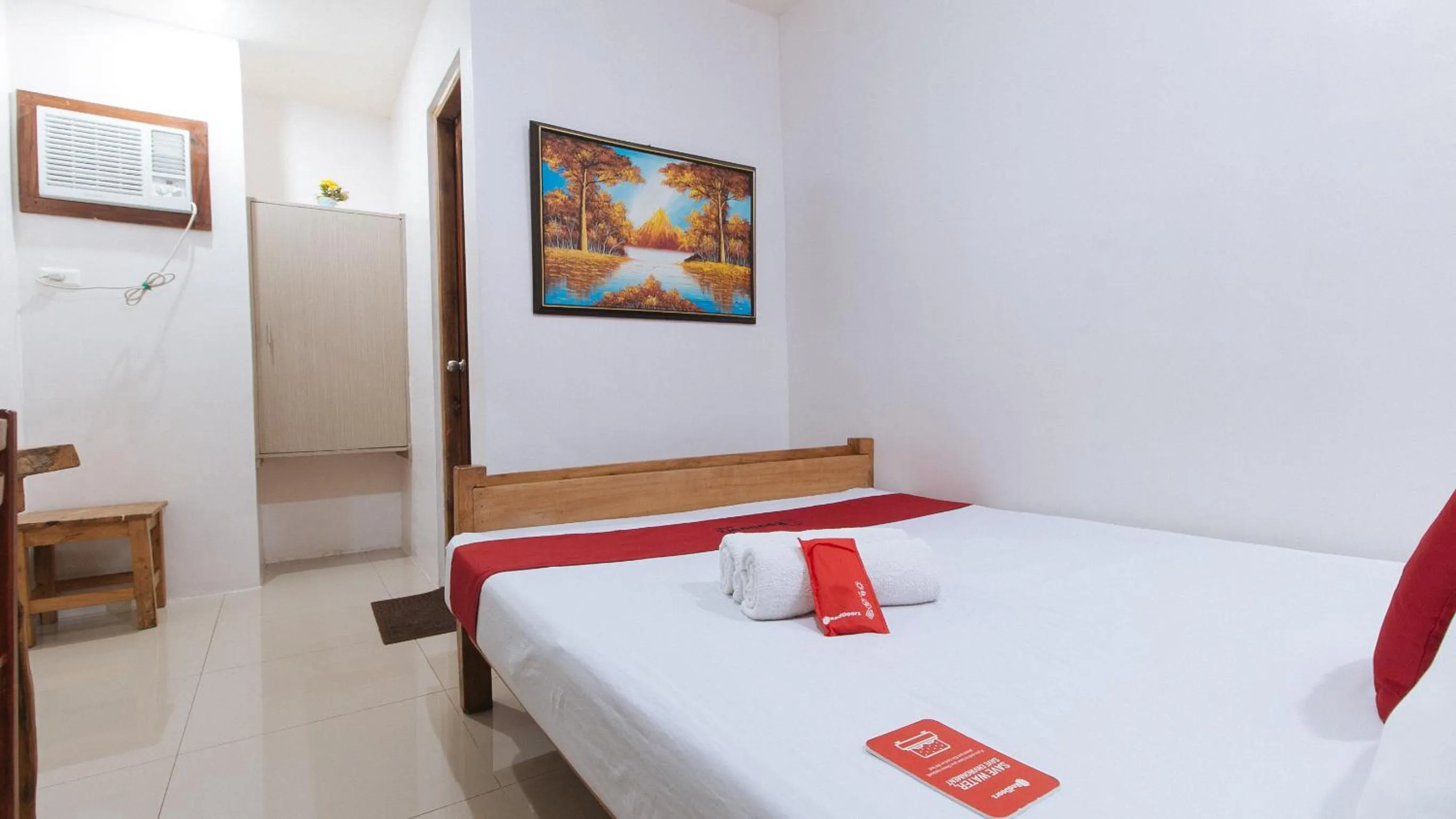 Photo of the whole room, Bed in RedDoorz Plus @ Jollydays Hotel Nueva Ecija