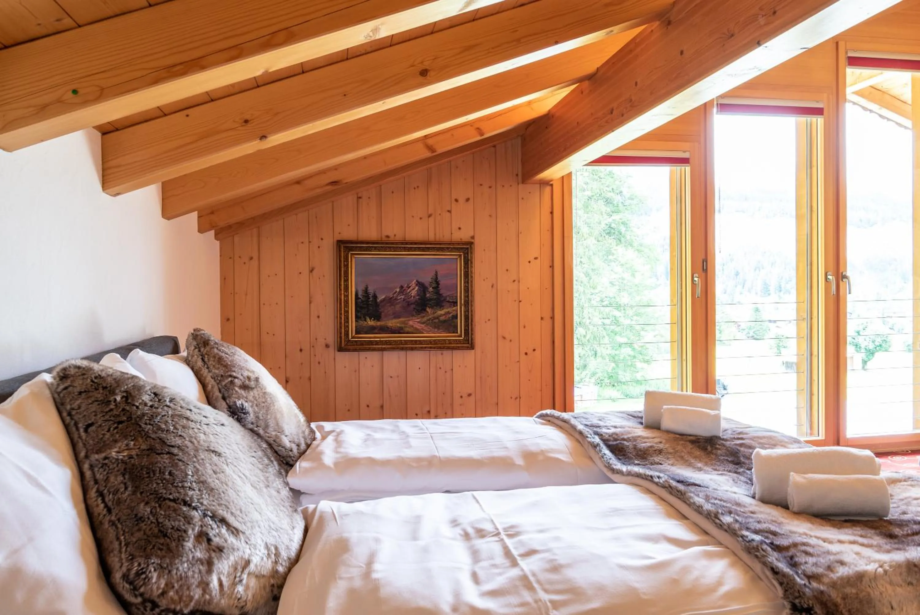 Bed in Typically Swiss Hotel Ermitage