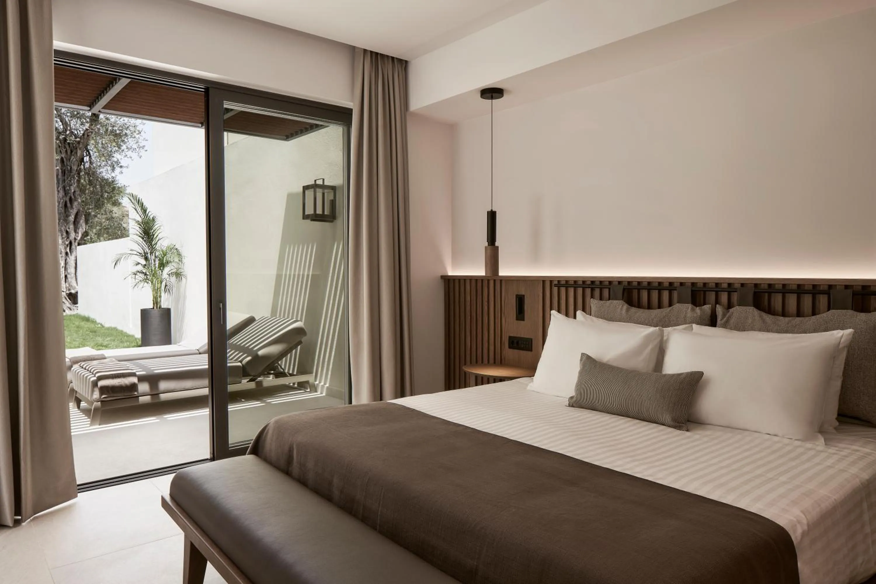 Bed in The Olivar Suites